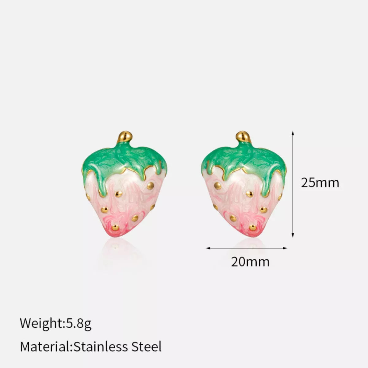 Pink and green strawberry stud earrings with gold accents on a neutral background