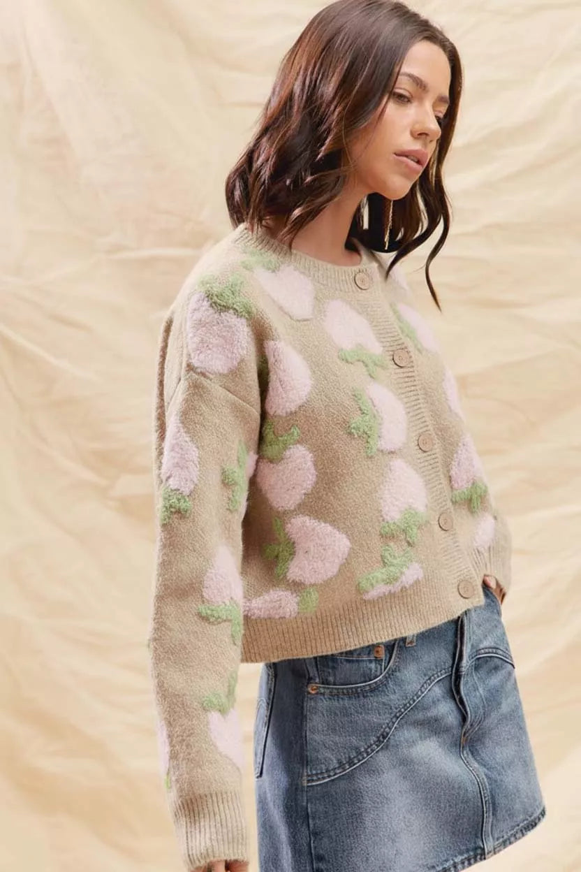 Model wearing beige strawberry button cardigan, cottagecore knit outfit for fall.