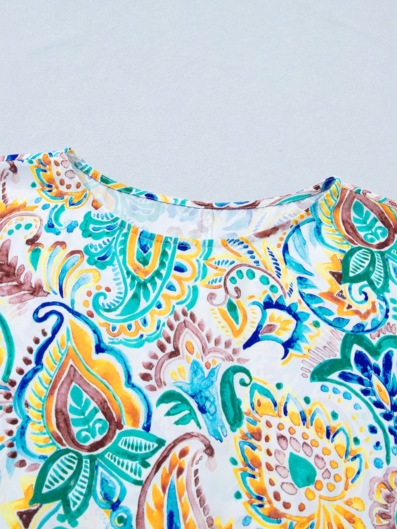 Relaxed short sleeve blouse with colorful paisley print