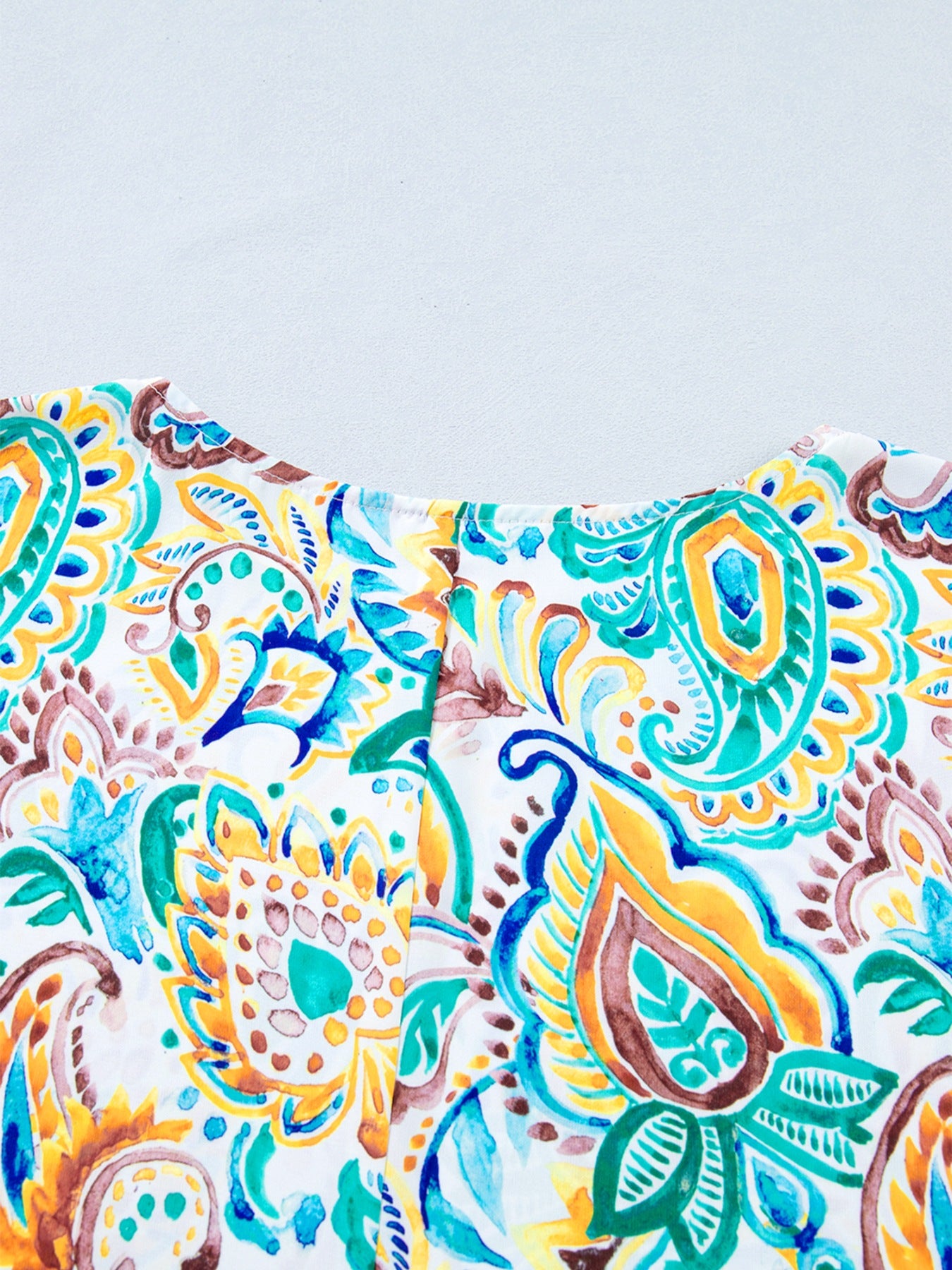 Relaxed short sleeve blouse with colorful paisley print