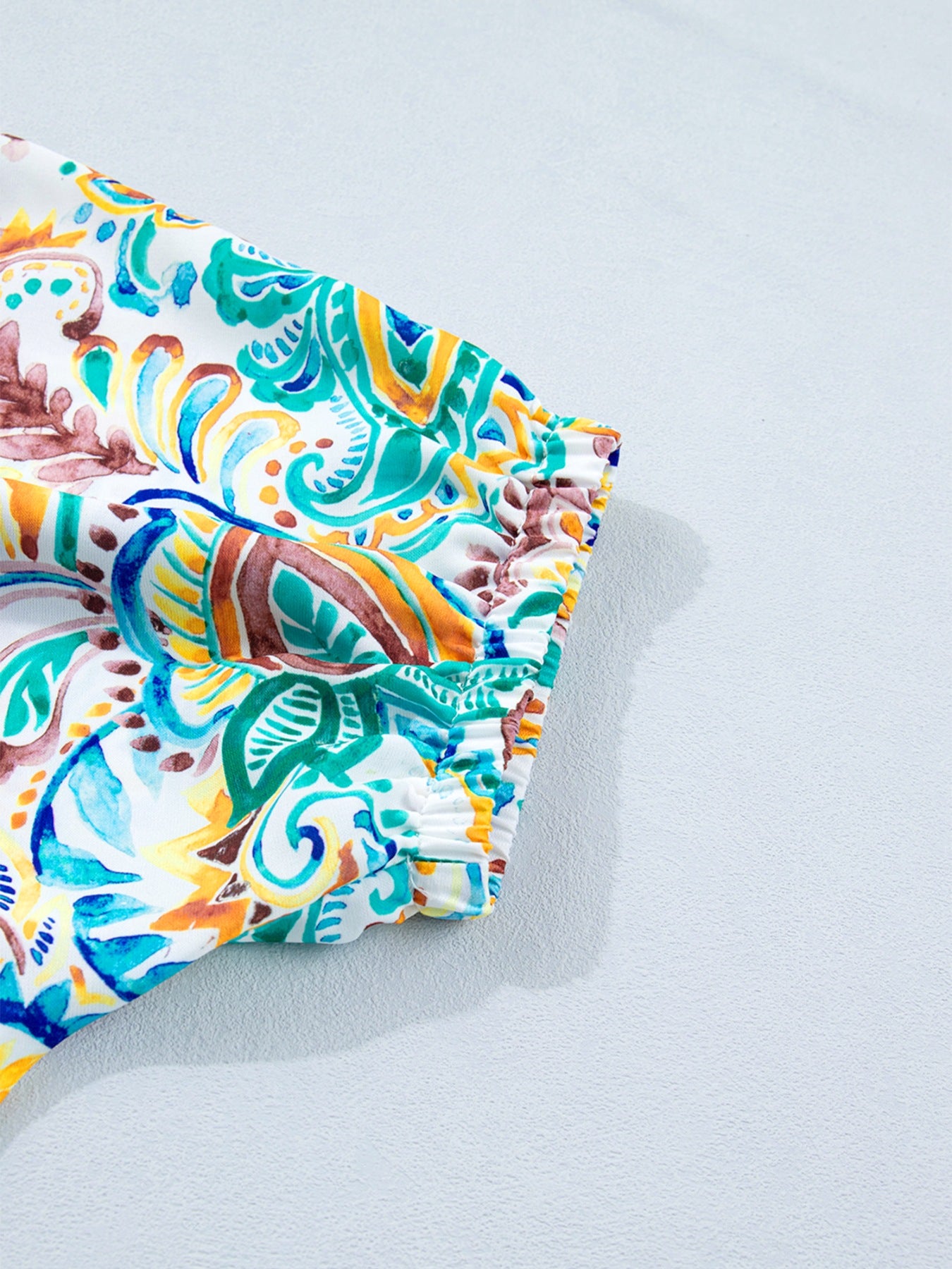 Relaxed short sleeve blouse with colorful paisley print