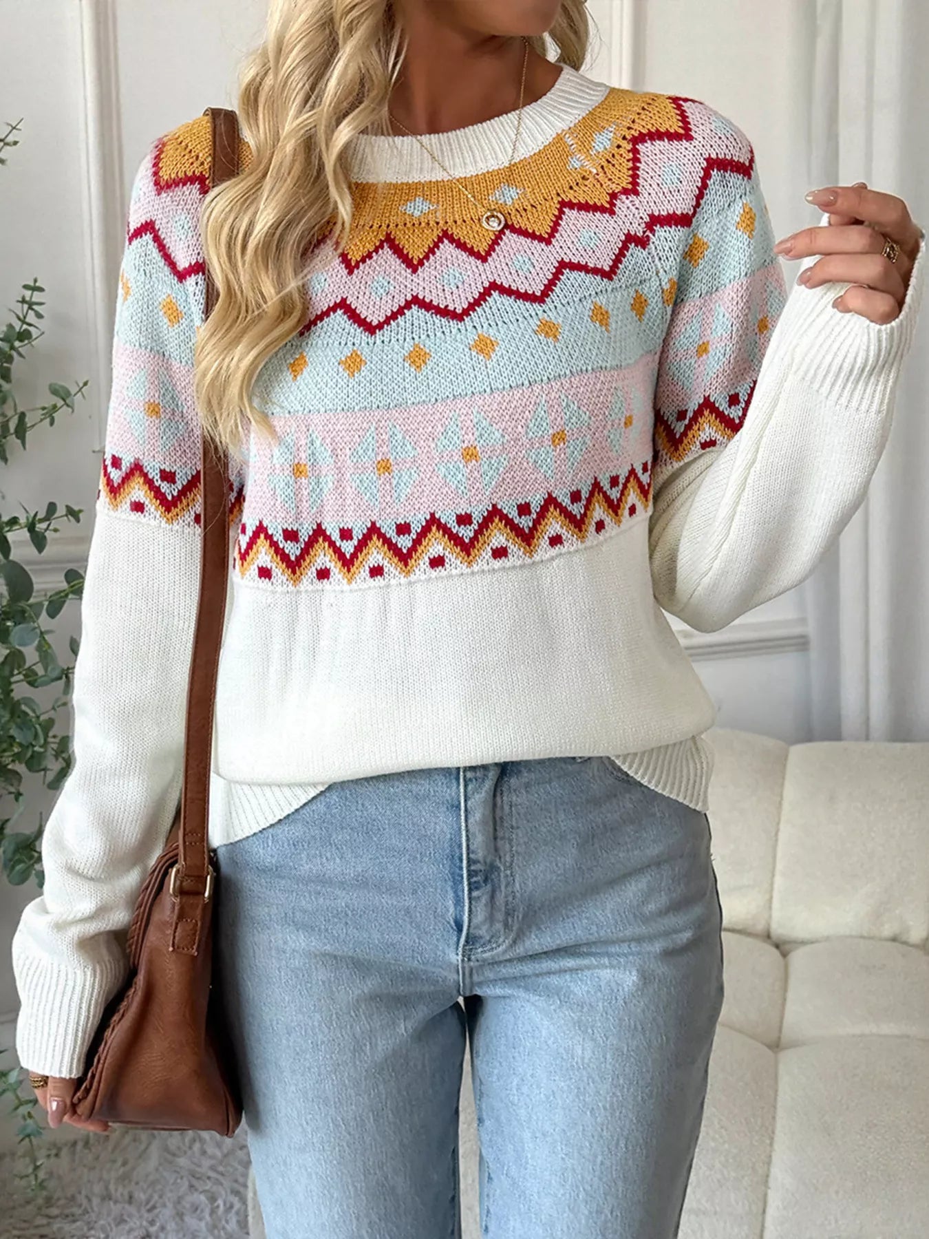 Cream Fair Isle sweater with colorful knit pattern in mustard, burgundy, and blush tones