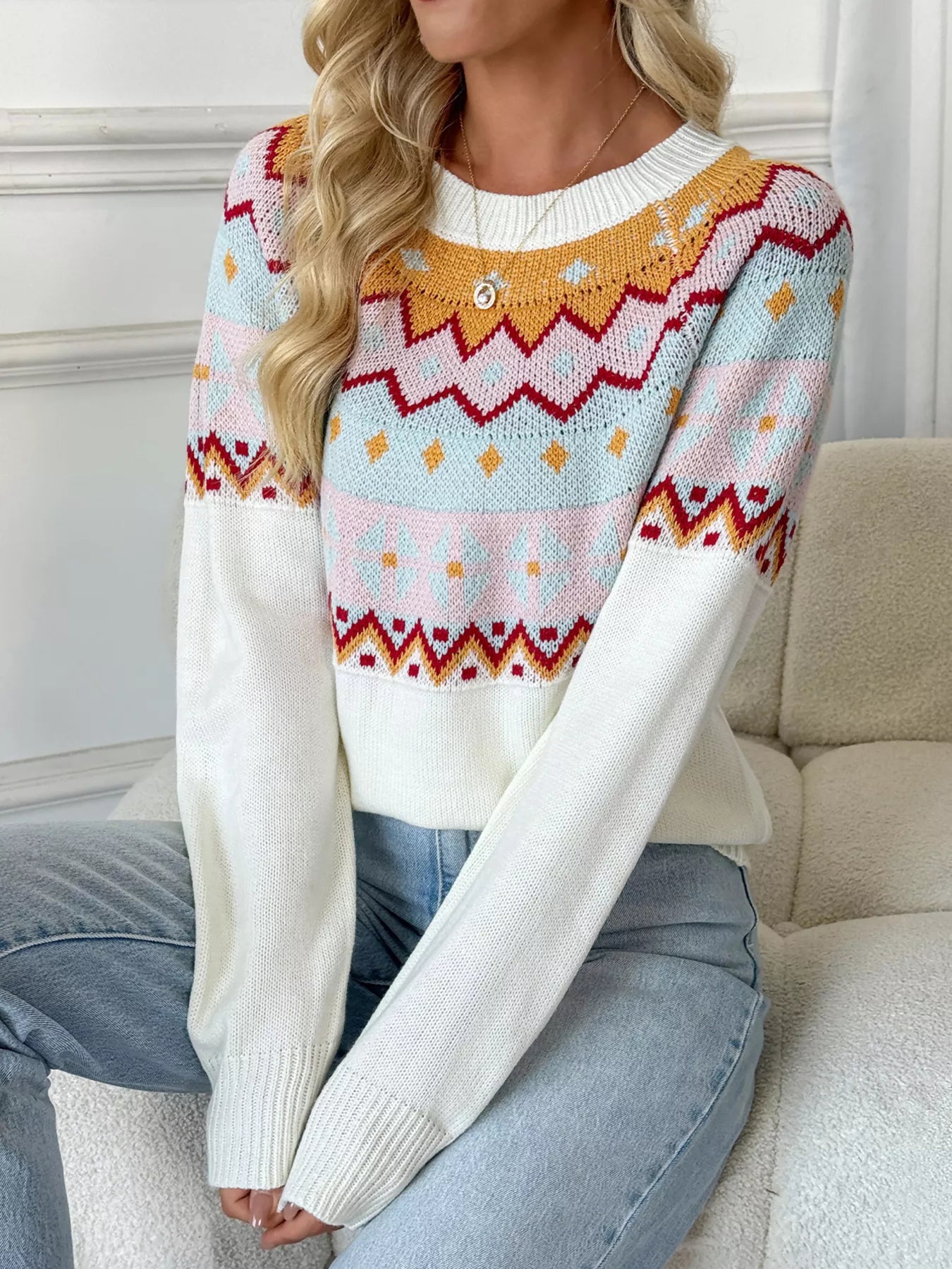 Cream Fair Isle sweater with colorful knit pattern in mustard, burgundy, and blush tones