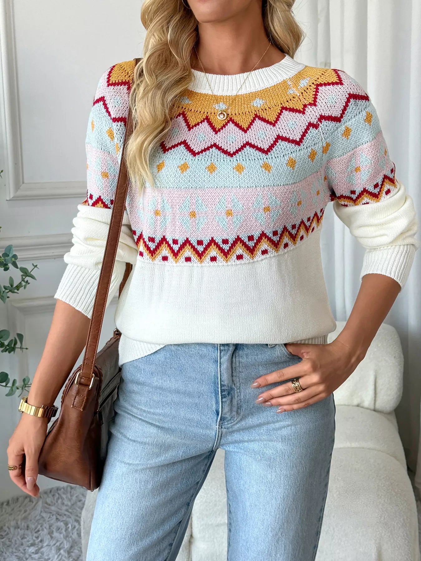 Cream Fair Isle sweater with colorful knit pattern in mustard, burgundy, and blush tones