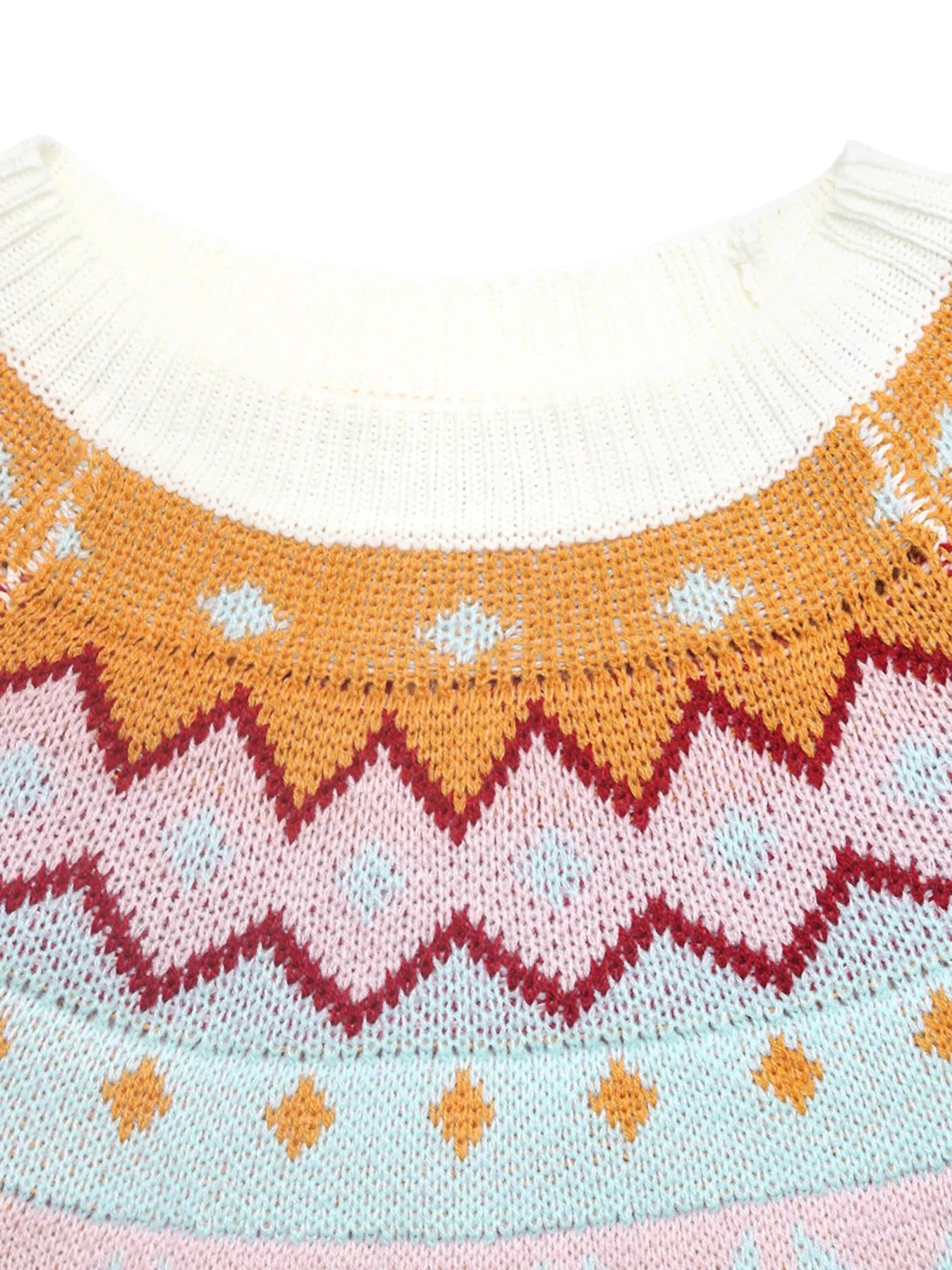 Cream Fair Isle sweater with colorful knit pattern in mustard, burgundy, and blush tones