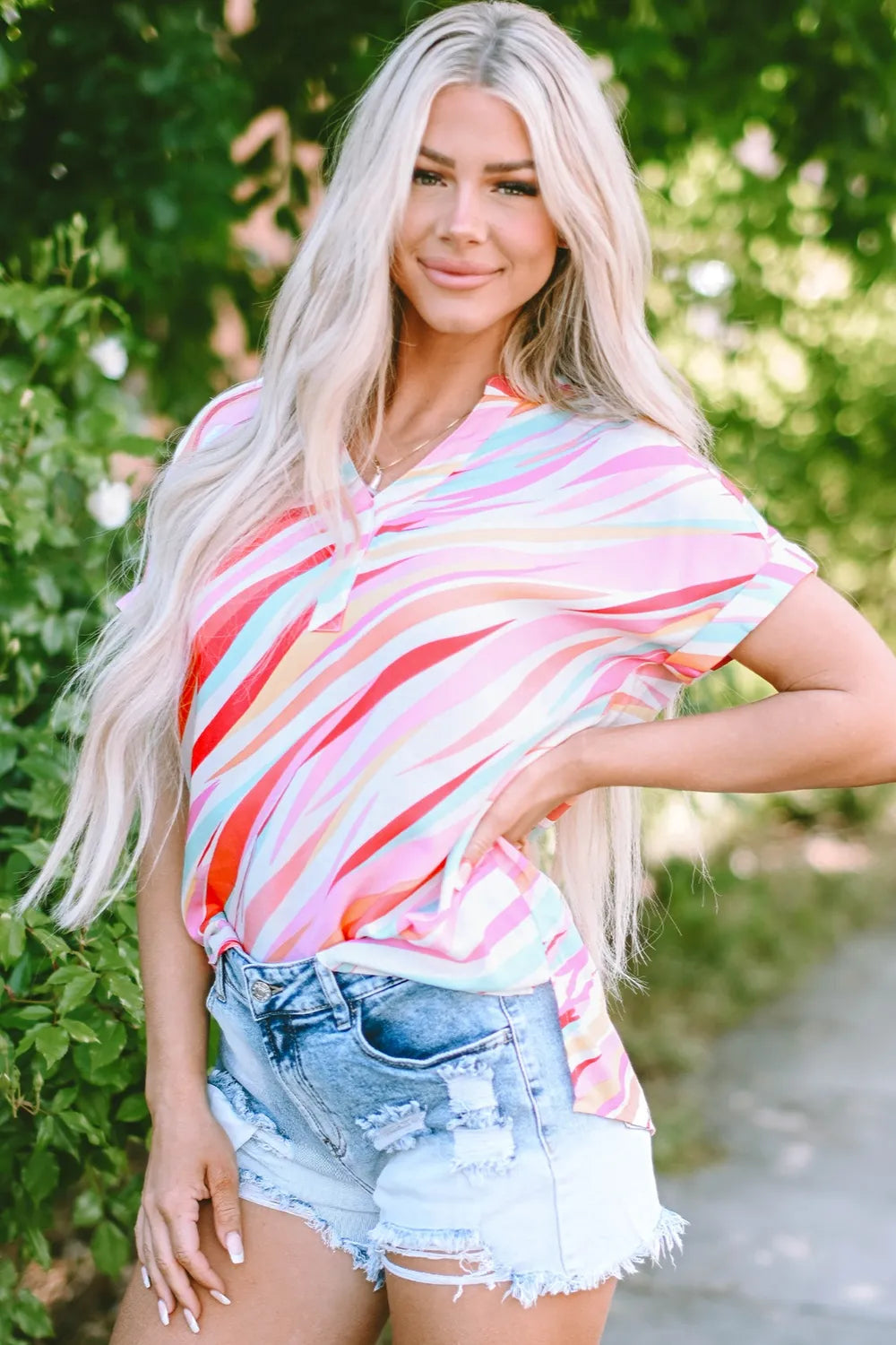 Vibrant pastel stripe boutique blouse made from lightweight viscose