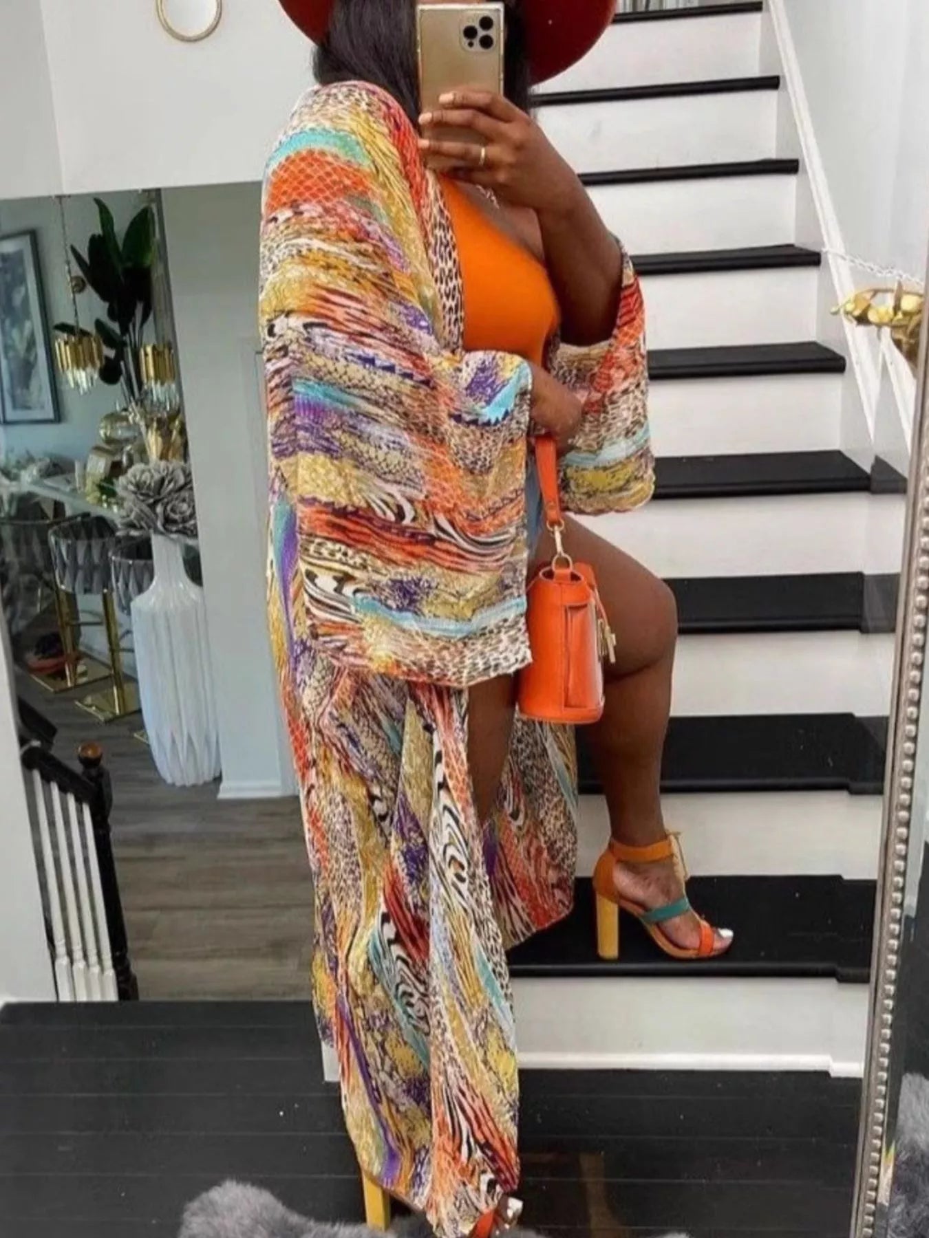 colorful oversized boho duster kimono worn over denim shorts and tank top
