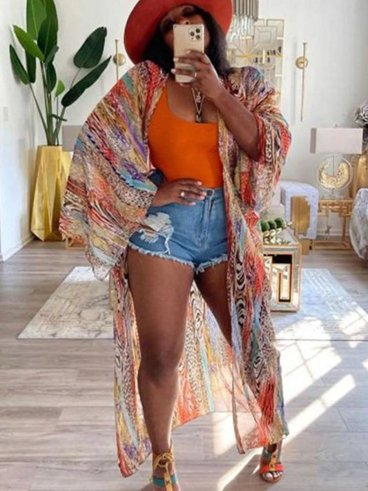 colorful oversized boho duster kimono worn over denim shorts and tank top