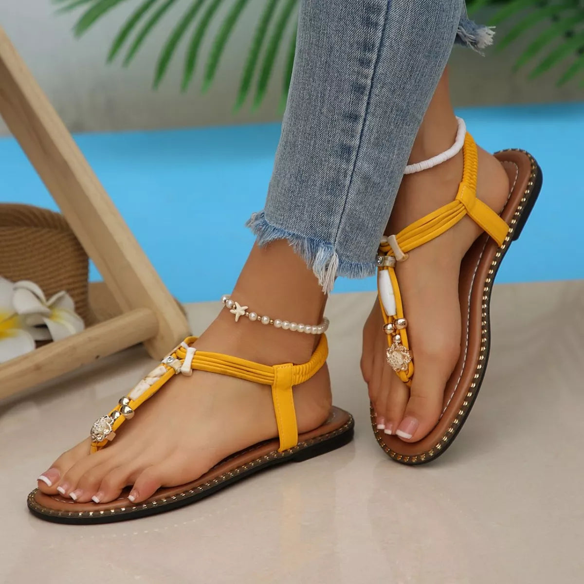 colorful woven boho sandals with bead accents and flat sole