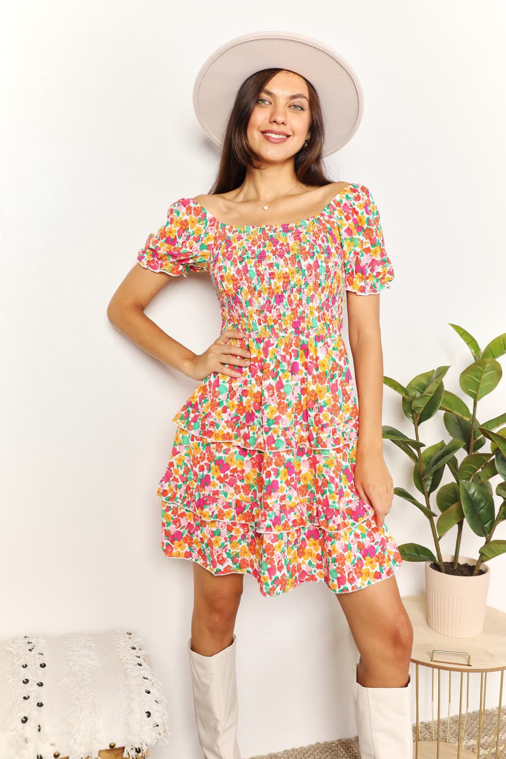 Colorful floral smocked mini dress with sweetheart neckline and tiered skirt