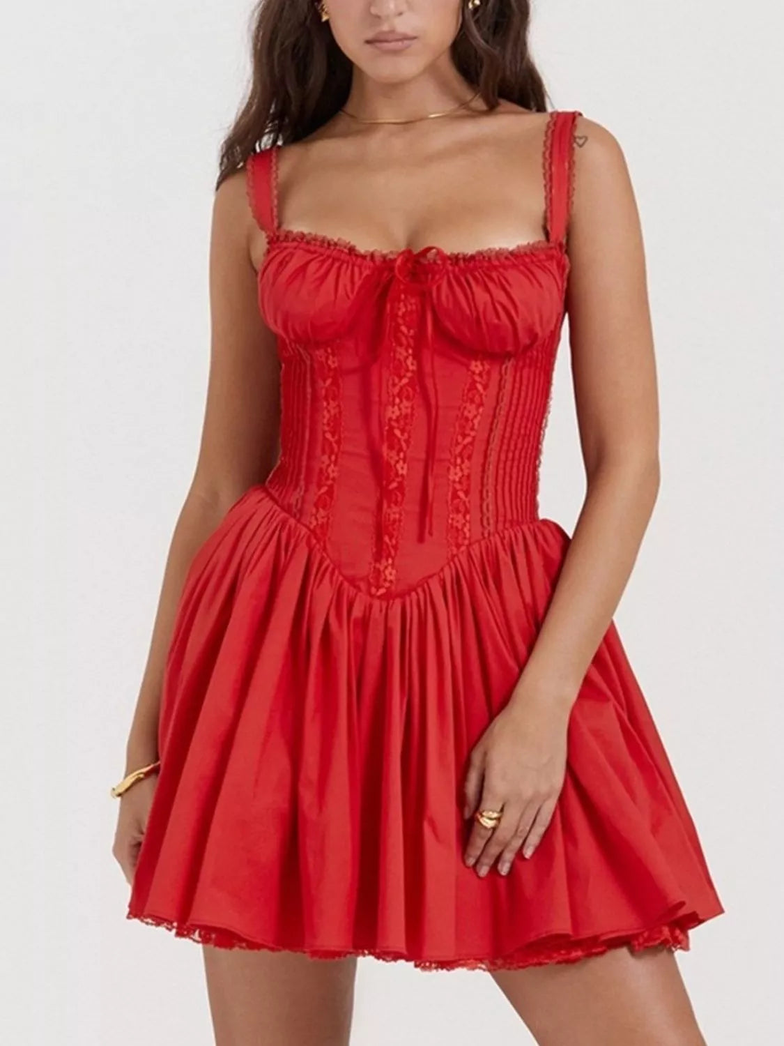 Woman modeling a red Sweetheart Corset Mini Dress with lace-up front, lace accents, and a flared mini skirt, styled against a white background.