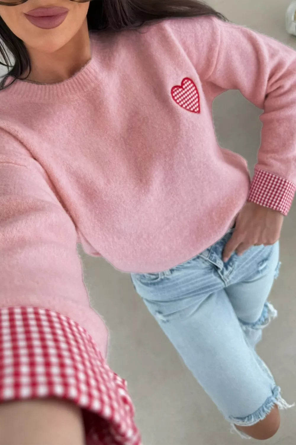 Blush pink knit sweater with embroidered gingham heart and gingham cuff details