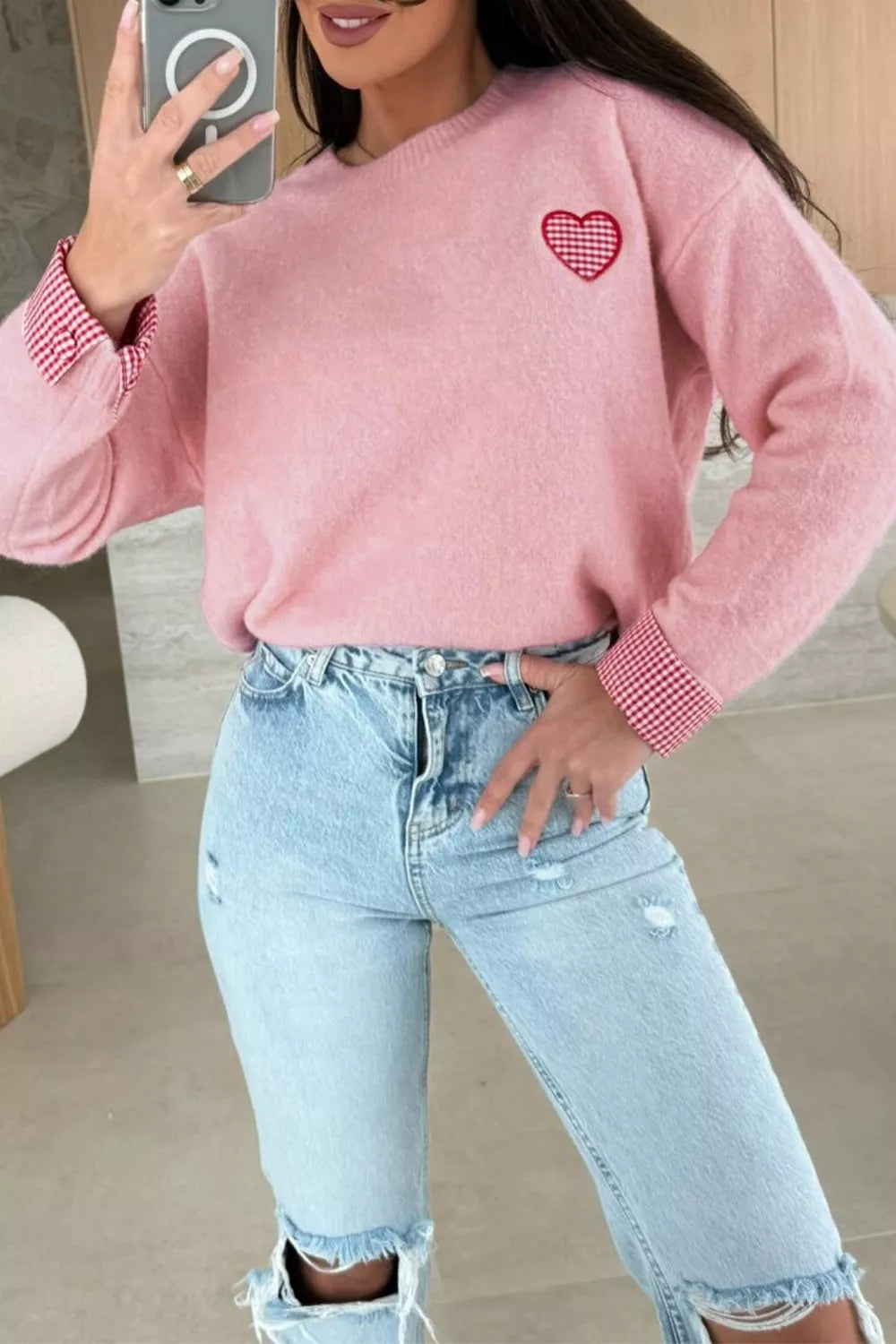 Blush pink knit sweater with embroidered gingham heart and gingham cuff details