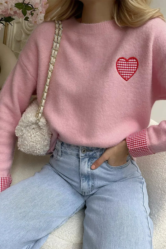 Blush pink knit sweater with embroidered gingham heart and gingham cuff details