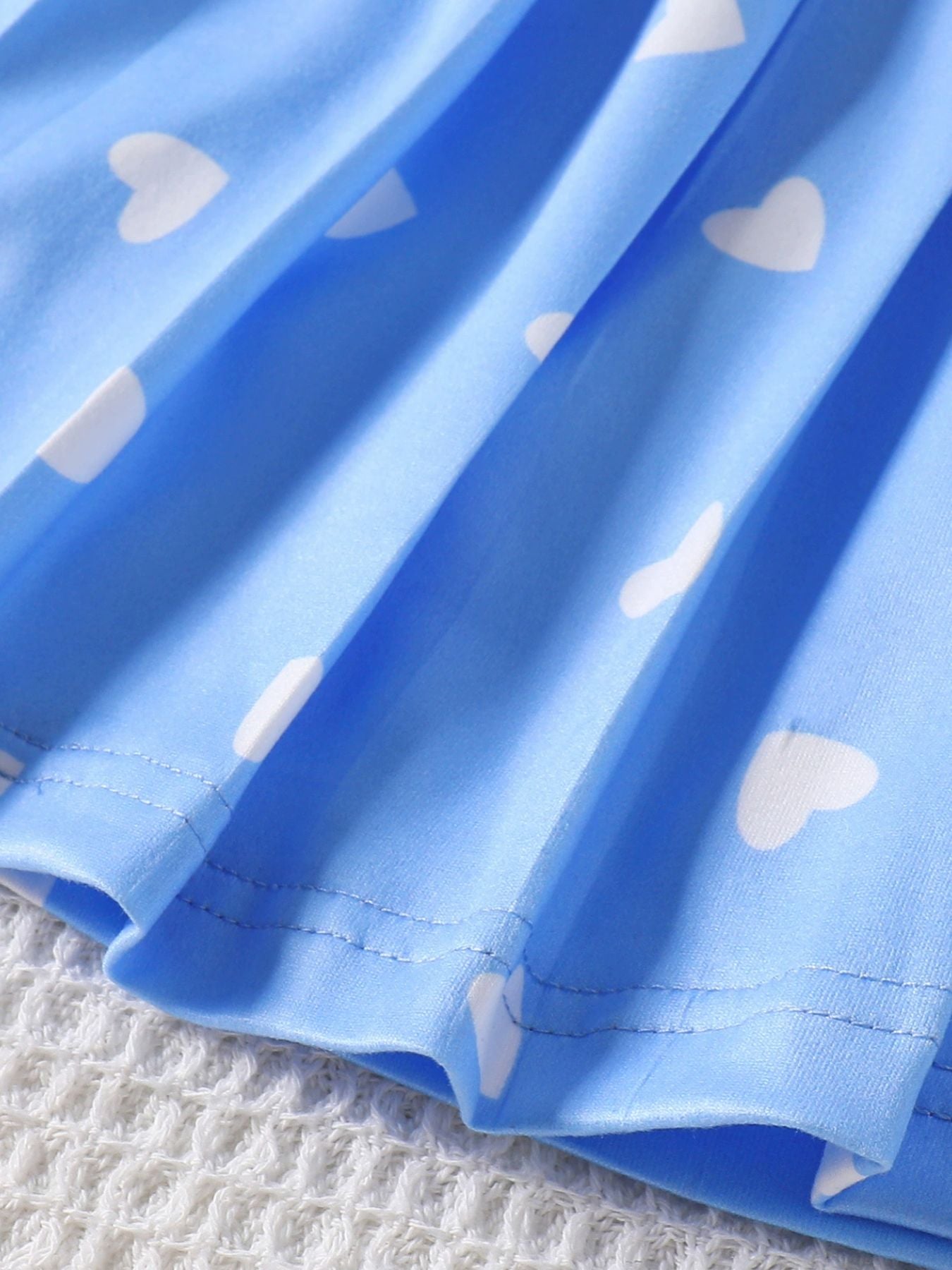 Blue girls dress with white heart print and polo collar