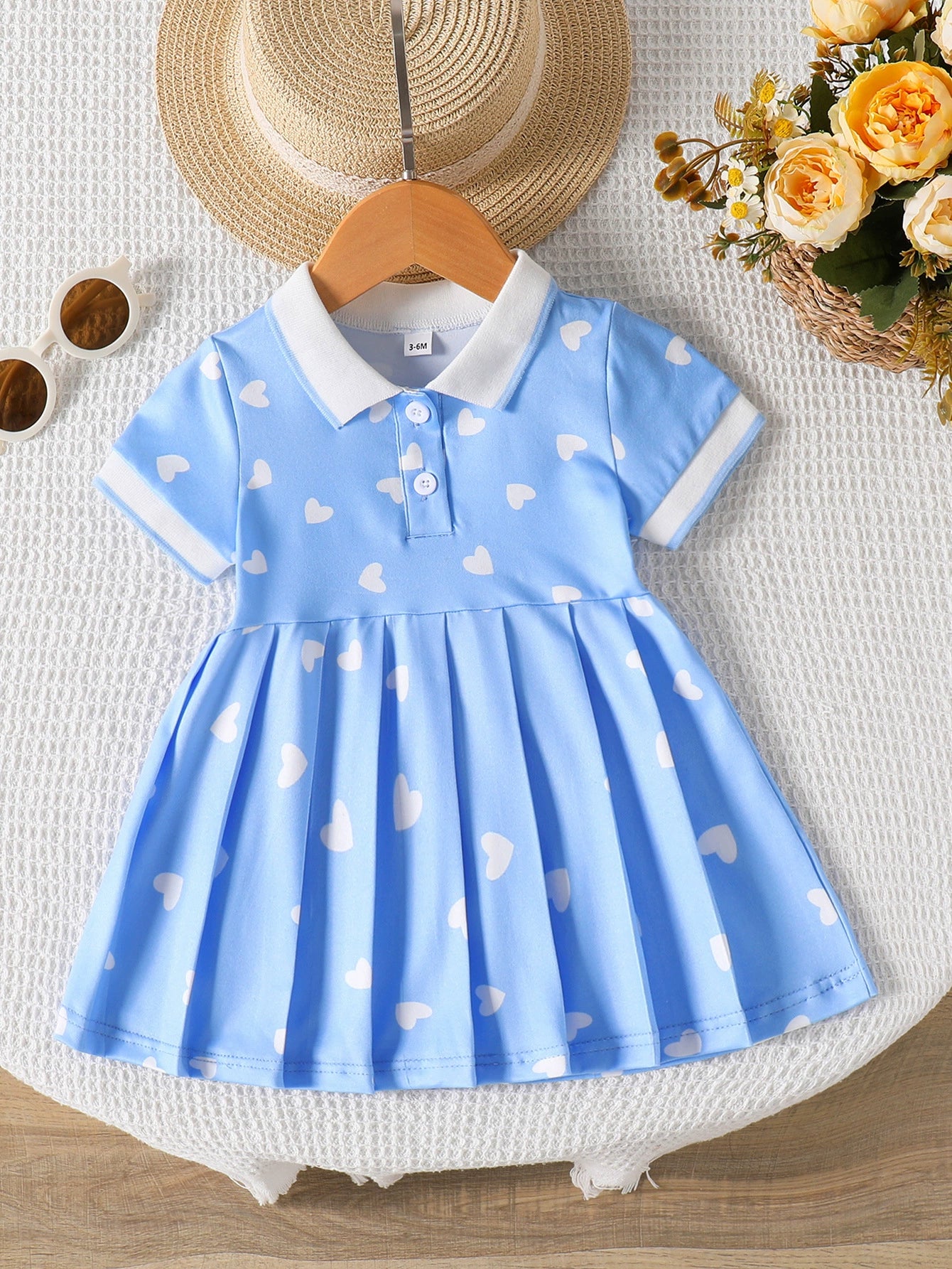 Blue girls dress with white heart print and polo collar