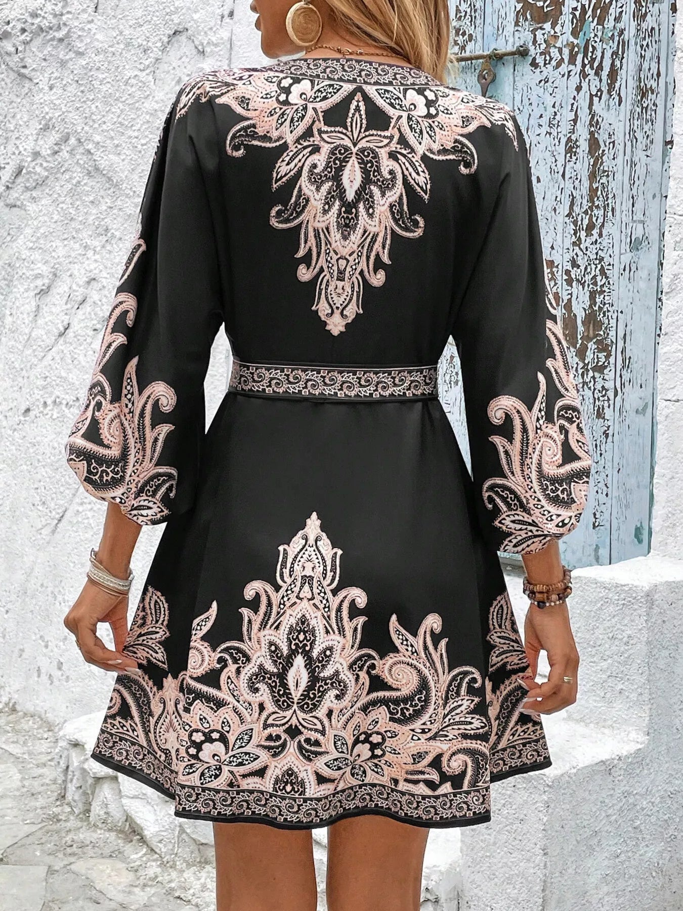 Model wearing black printed balloon sleeve Timeless Grace Mini Dress