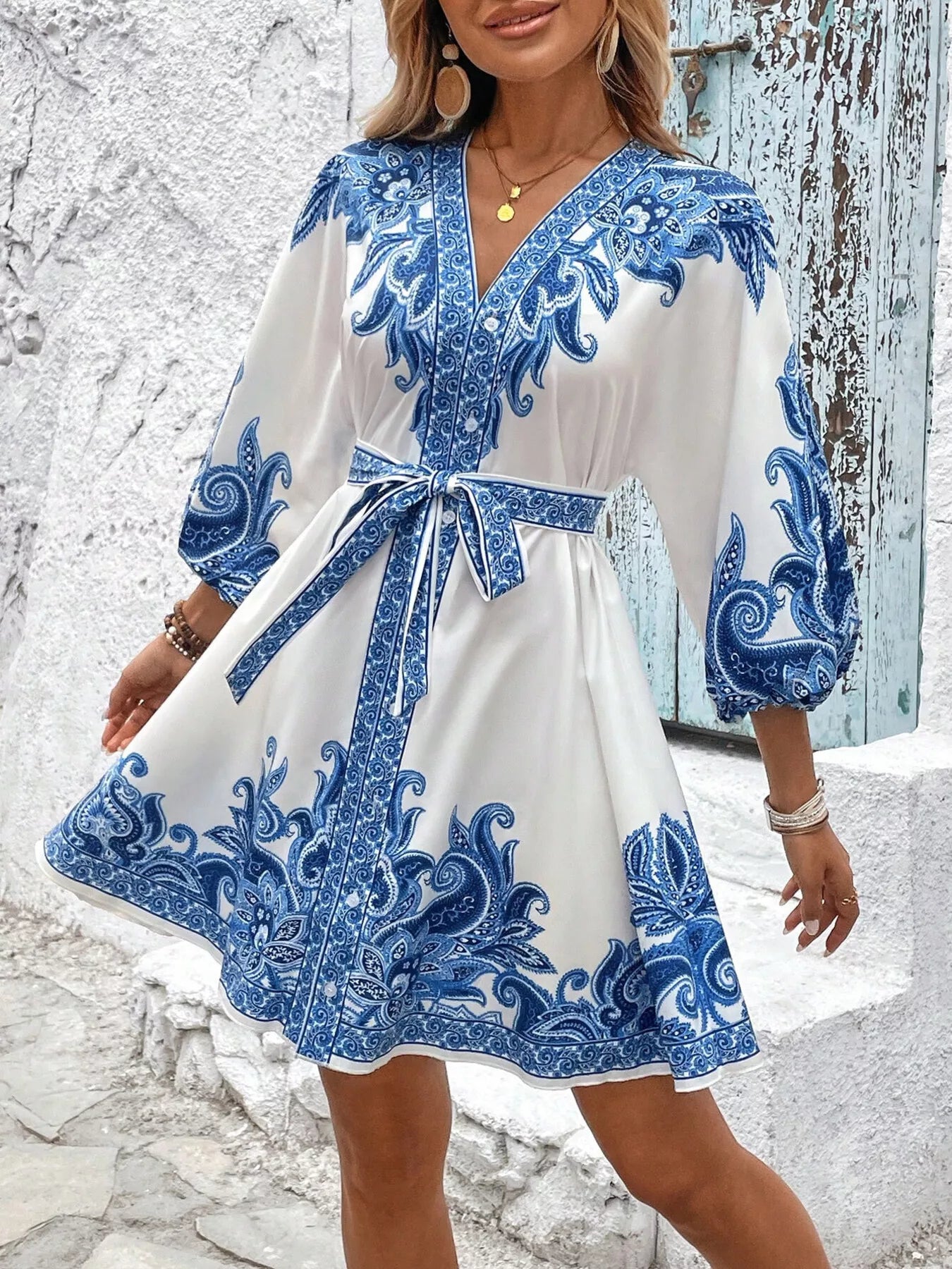 Model wearing blue printed balloon sleeve Timeless Grace Mini Dress
