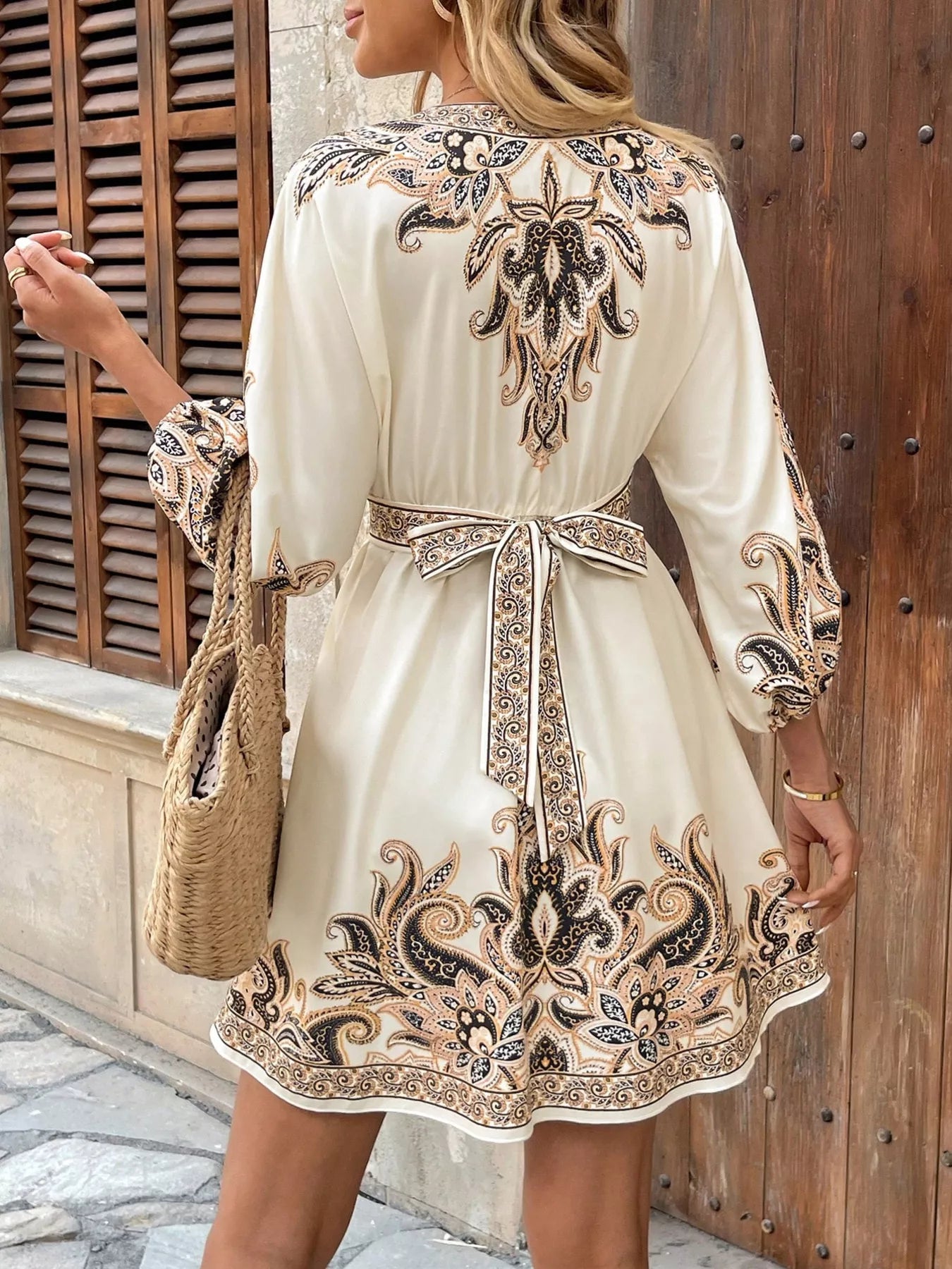 Model wearing cream printed balloon sleeve Timeless Grace Mini Dress
