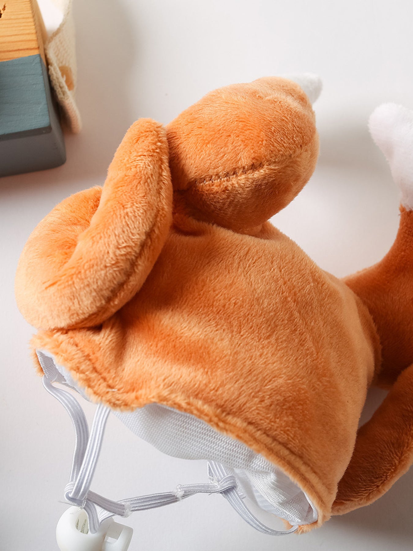 a plush turkey-shaped pet hat