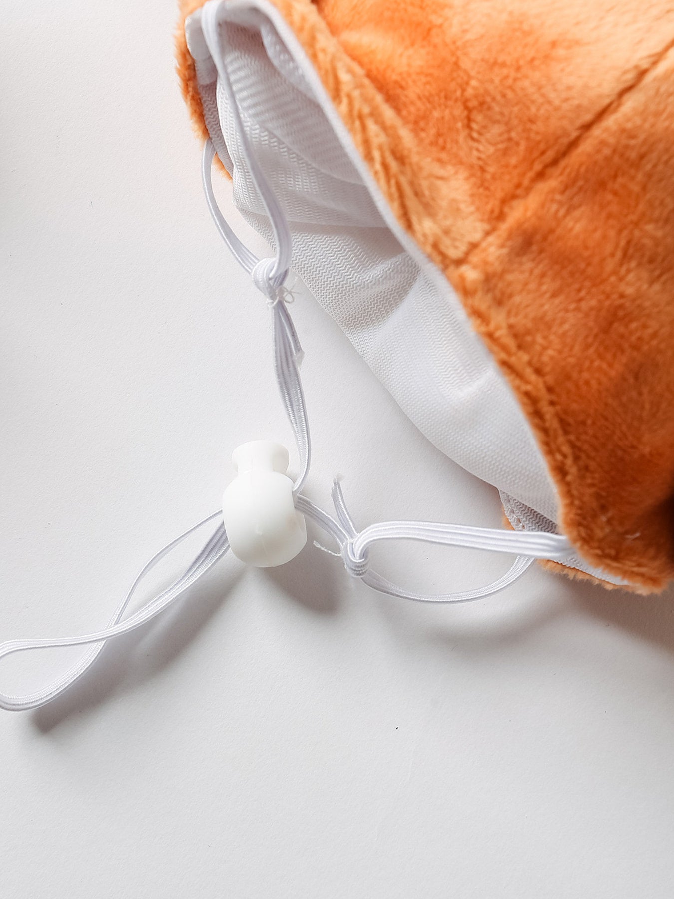 a plush turkey-shaped pet hat