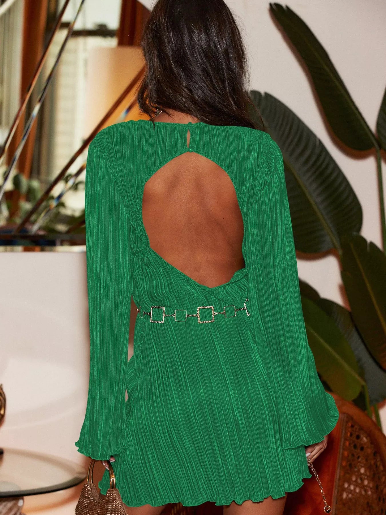 Velour Nights Cutout Dress in dark green with flare sleeves and cutout back