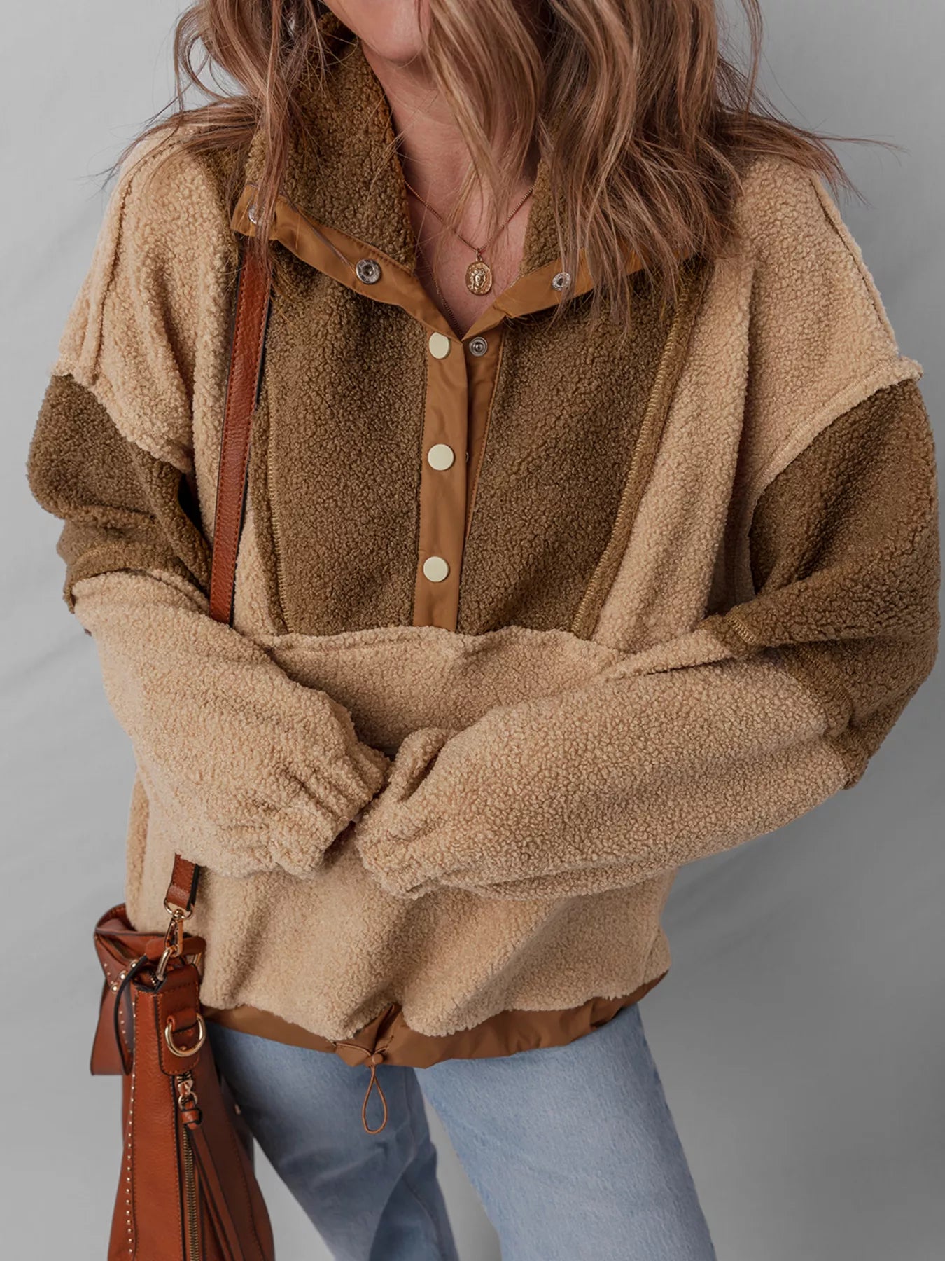 Colorblock sherpa pullover with buttoned neckline