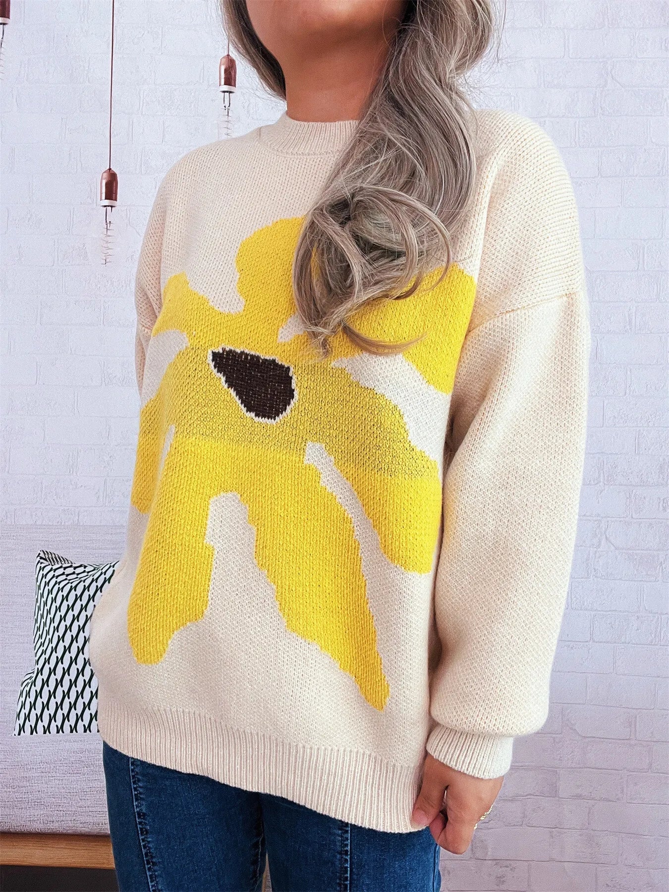 Apricot oversized sweater with trippy daisy flower design – Wavy Daisy style from A Whimsical Affair.