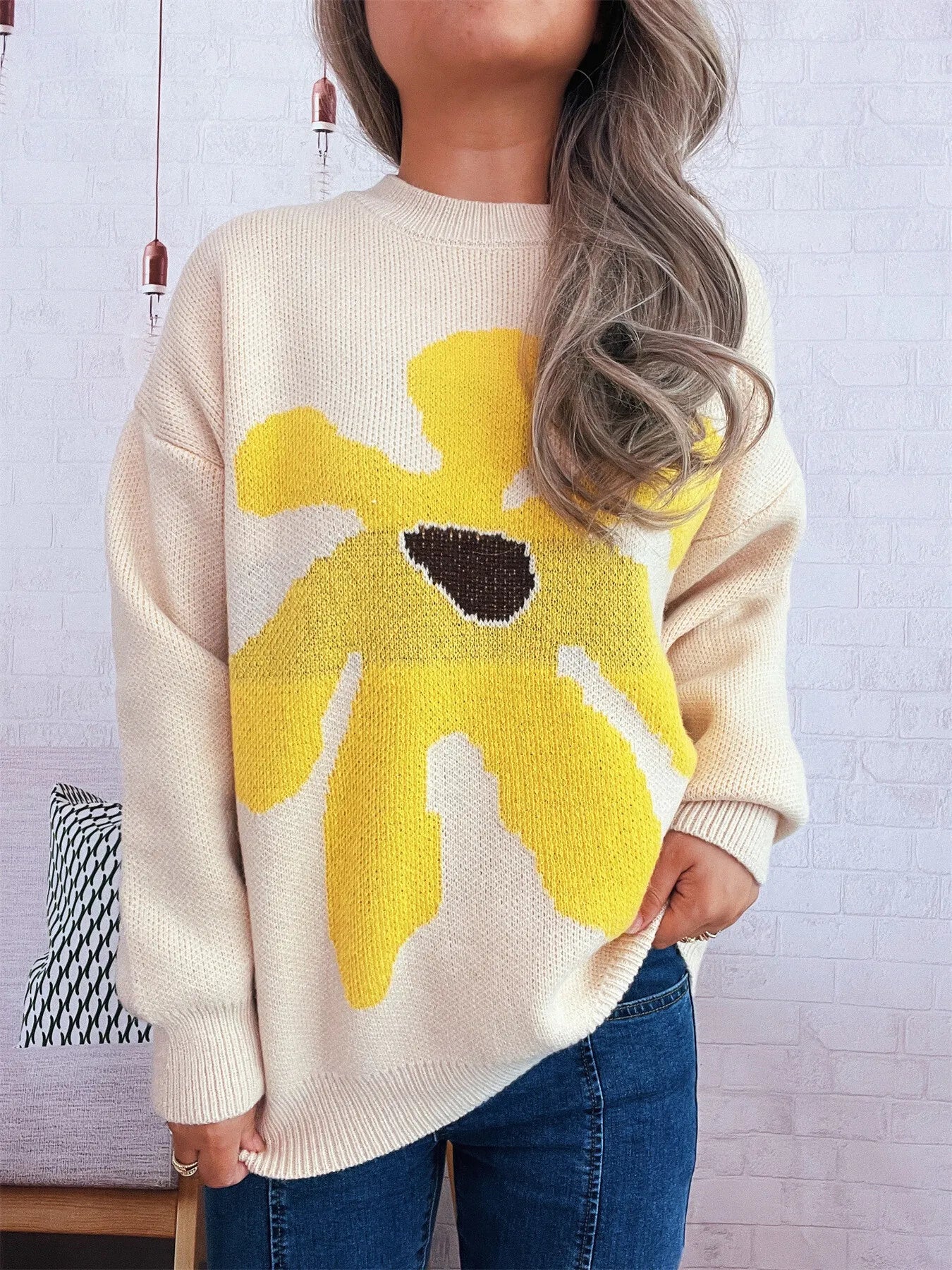 Apricot oversized sweater with trippy daisy flower design – Wavy Daisy style from A Whimsical Affair.