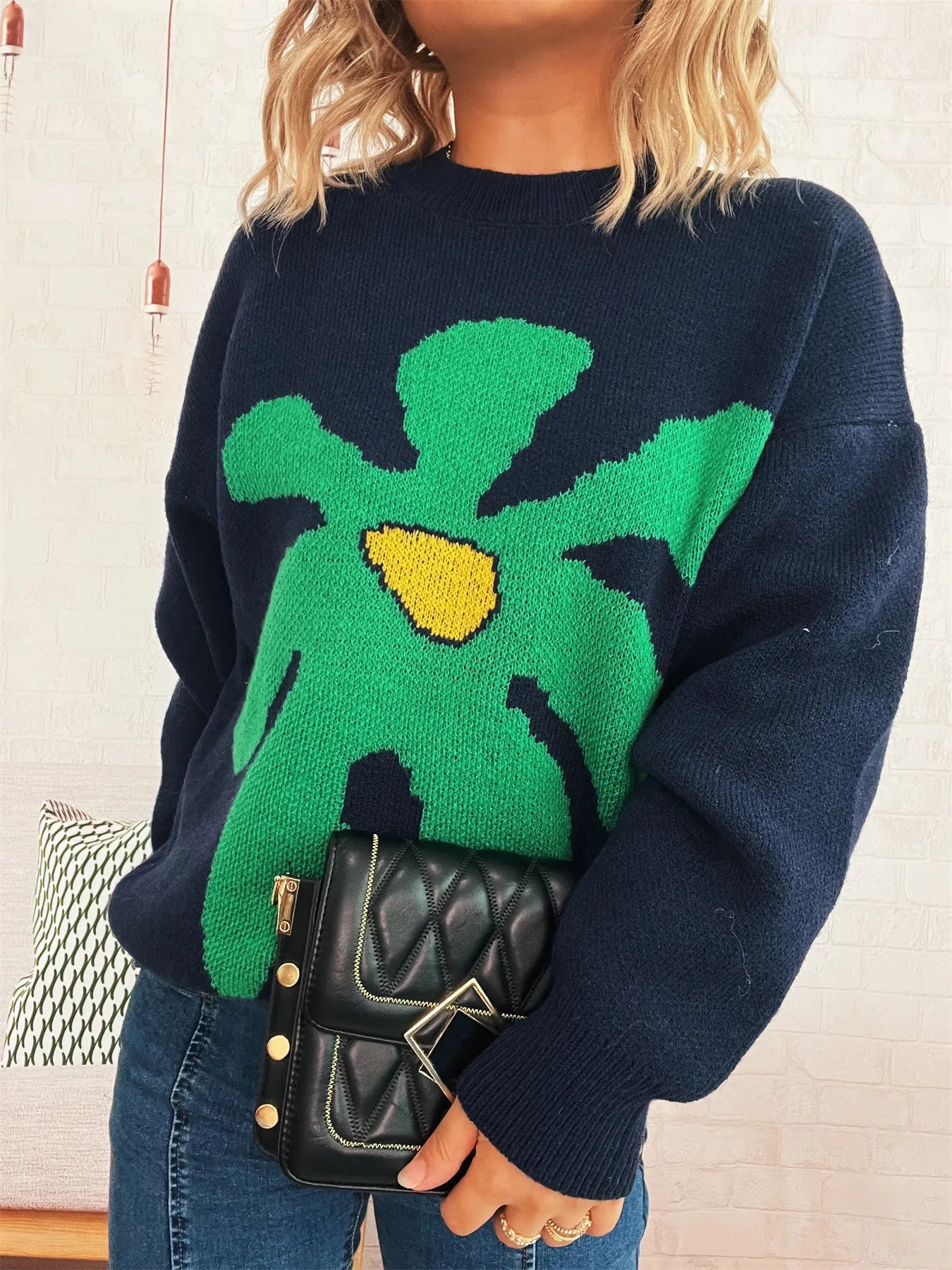 Dark blue oversized sweater with trippy daisy flower design – Wavy Daisy style from A Whimsical Affair.