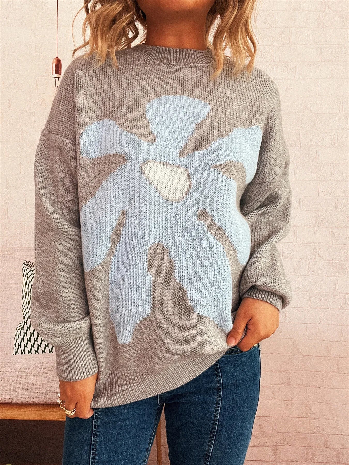 Gray oversized sweater with trippy daisy flower design – Wavy Daisy style from A Whimsical Affair.