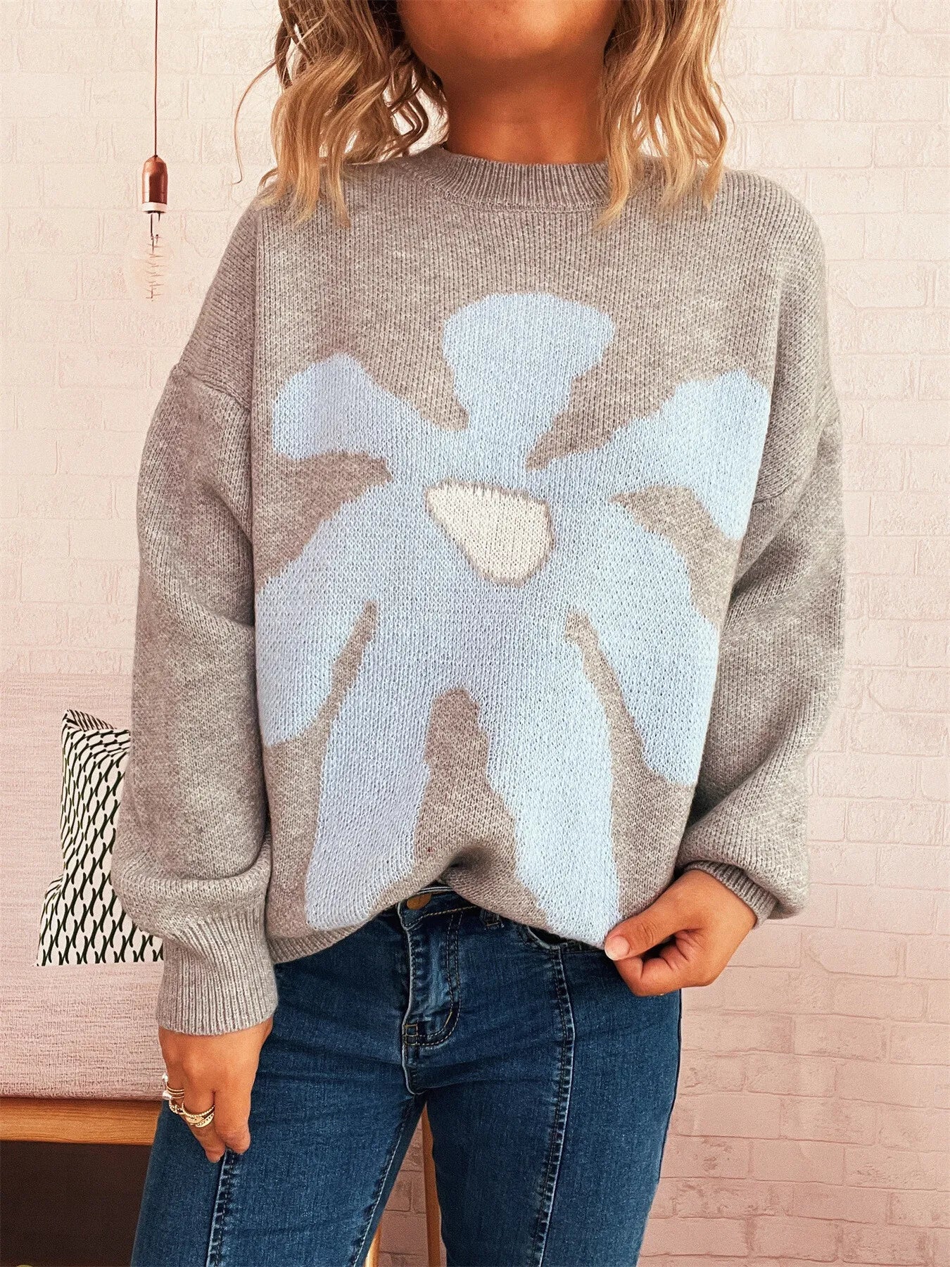 Gray oversized sweater with trippy daisy flower design – Wavy Daisy style from A Whimsical Affair.