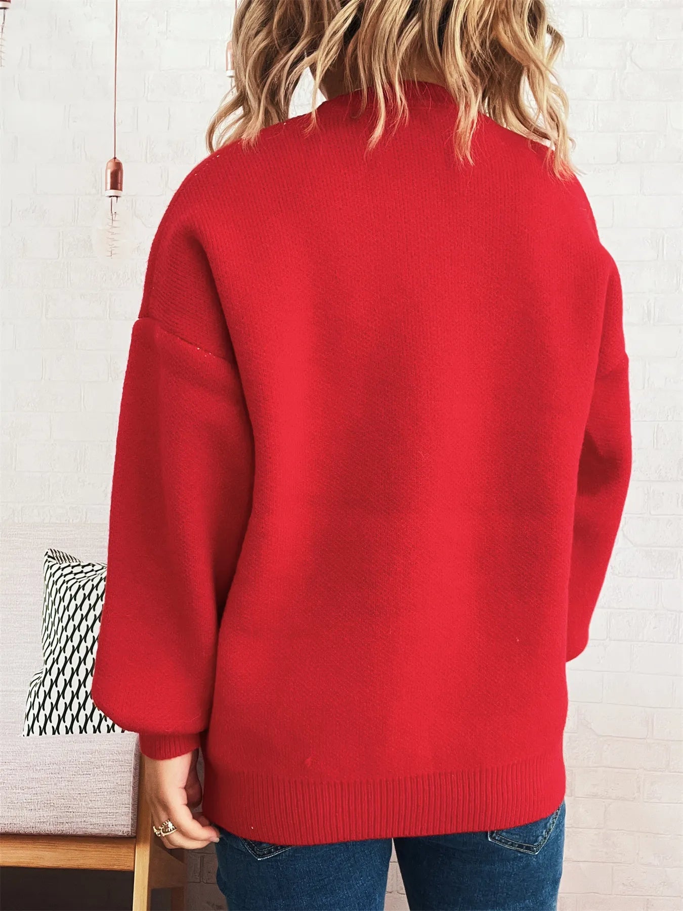 Red oversized sweater with trippy daisy flower design – Wavy Daisy style from A Whimsical Affair.