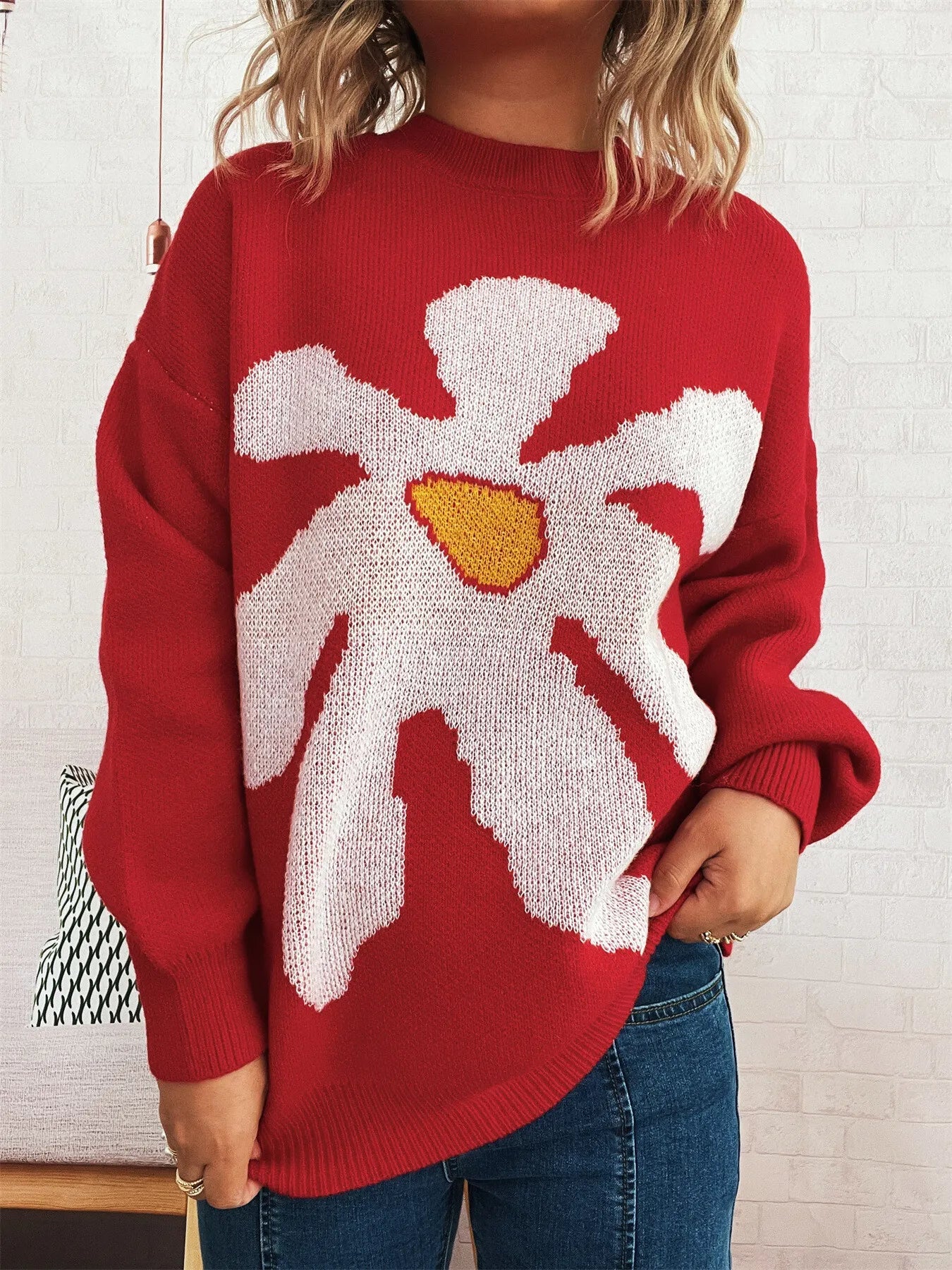 Red oversized sweater with trippy daisy flower design – Wavy Daisy style from A Whimsical Affair.