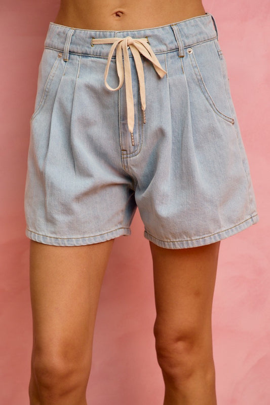Women’s mid rise denim shorts with adjustable drawstring and pockets