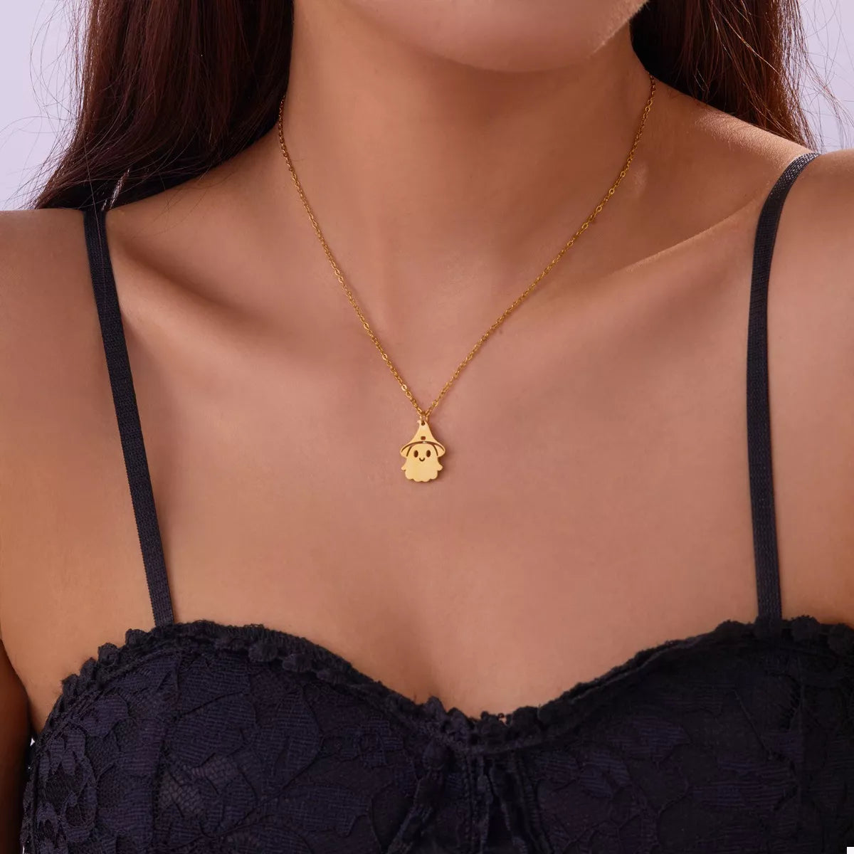 Whimsical Spirit Ghost Necklace – 18K gold-plated pendant with smiling ghost in a witch hat.