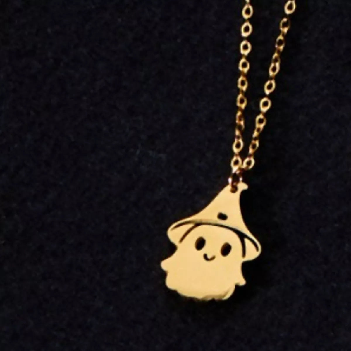 Whimsical Spirit Ghost Necklace – 18K gold-plated pendant with smiling ghost in a witch hat.