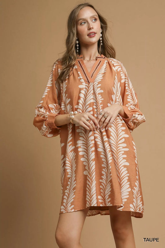 Whispering Leaves Taupe Mini Babydoll Dress with leaf print, notched neckline, and relaxed silhouette.
