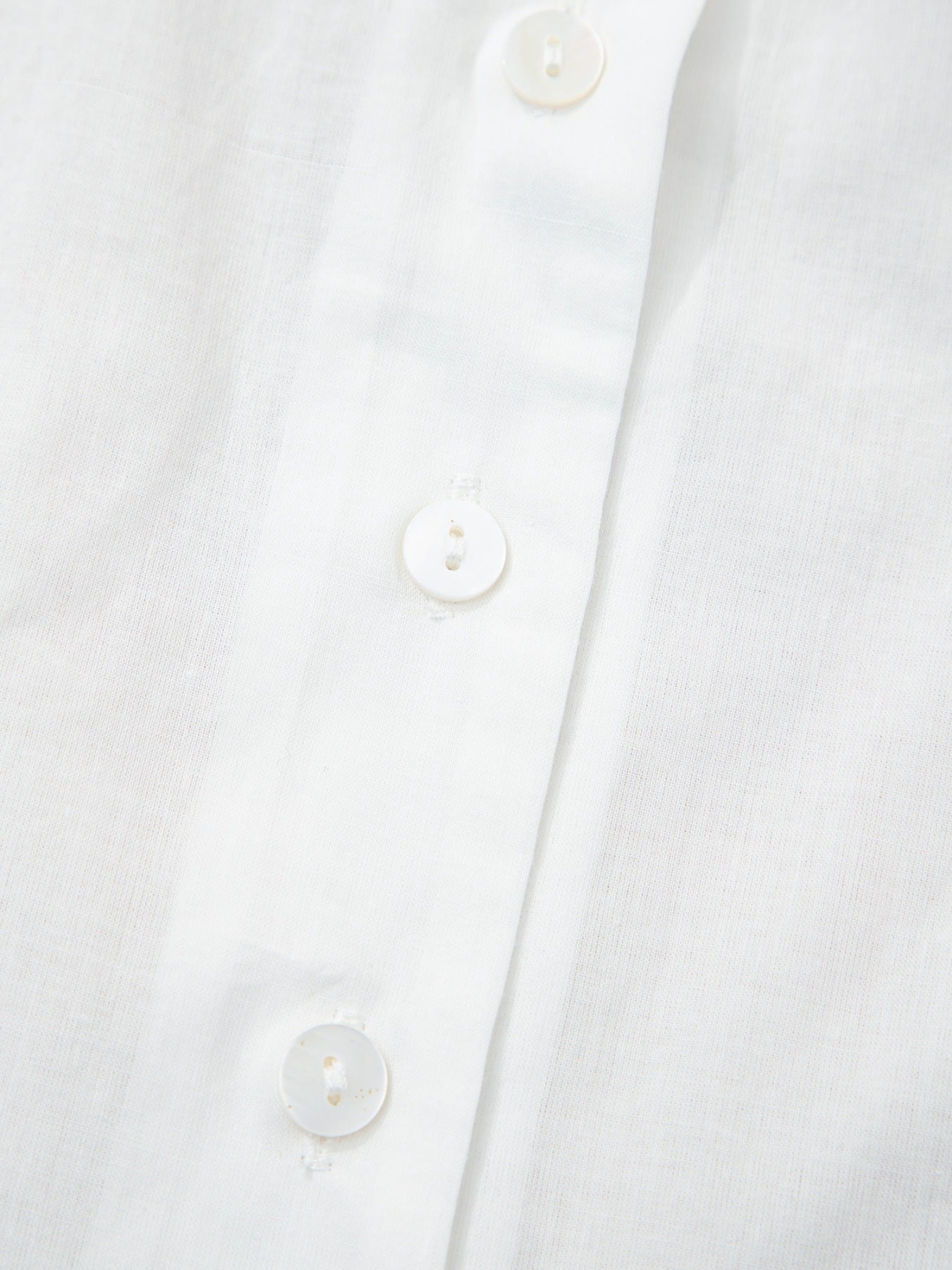White cotton blouse with eyelet embroidery and button front