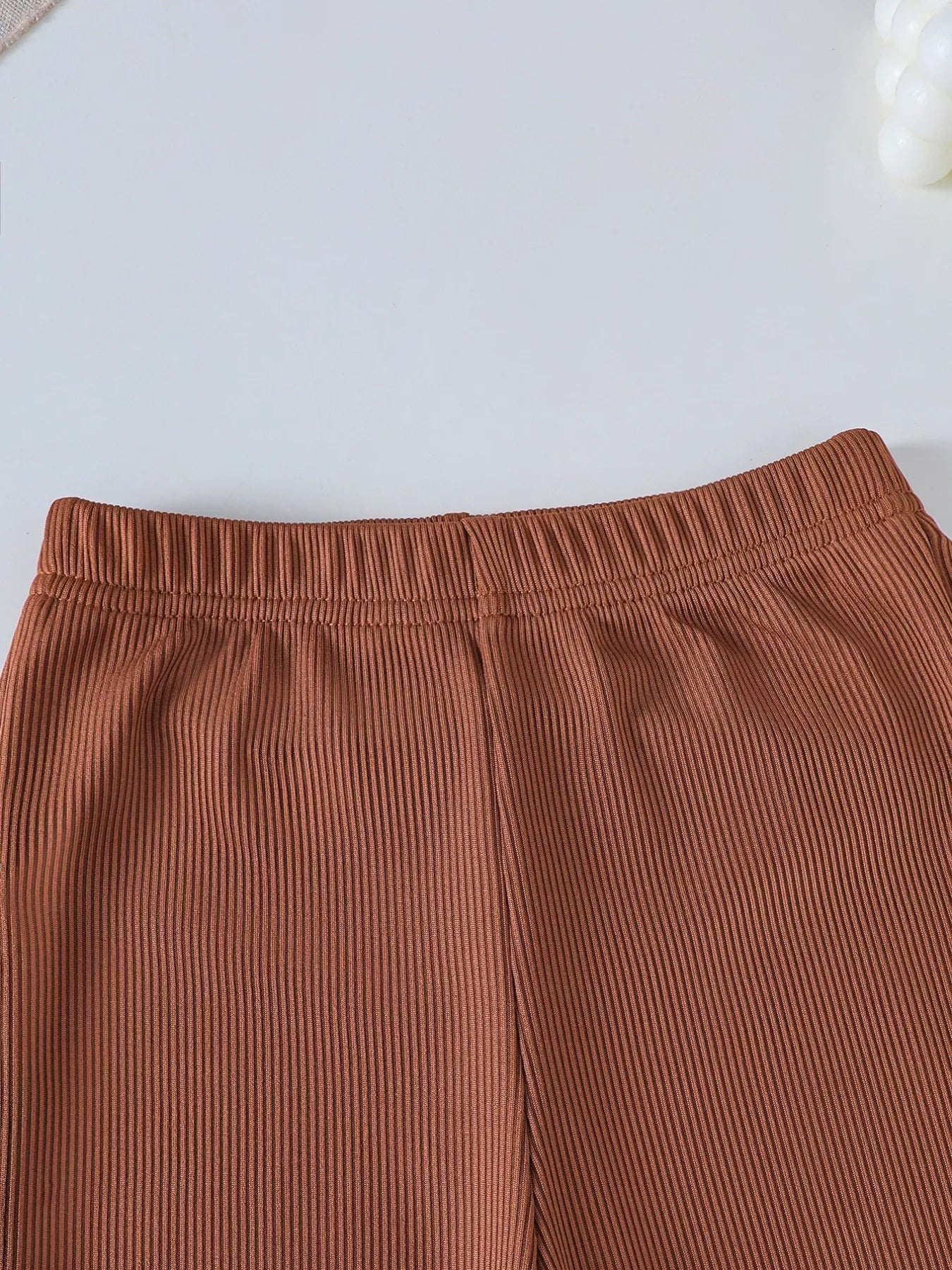 toddler halloween outfit with wicked cute pumpkin ghost sweatshirt and brown ribbed bell-bottom pants two-piece set