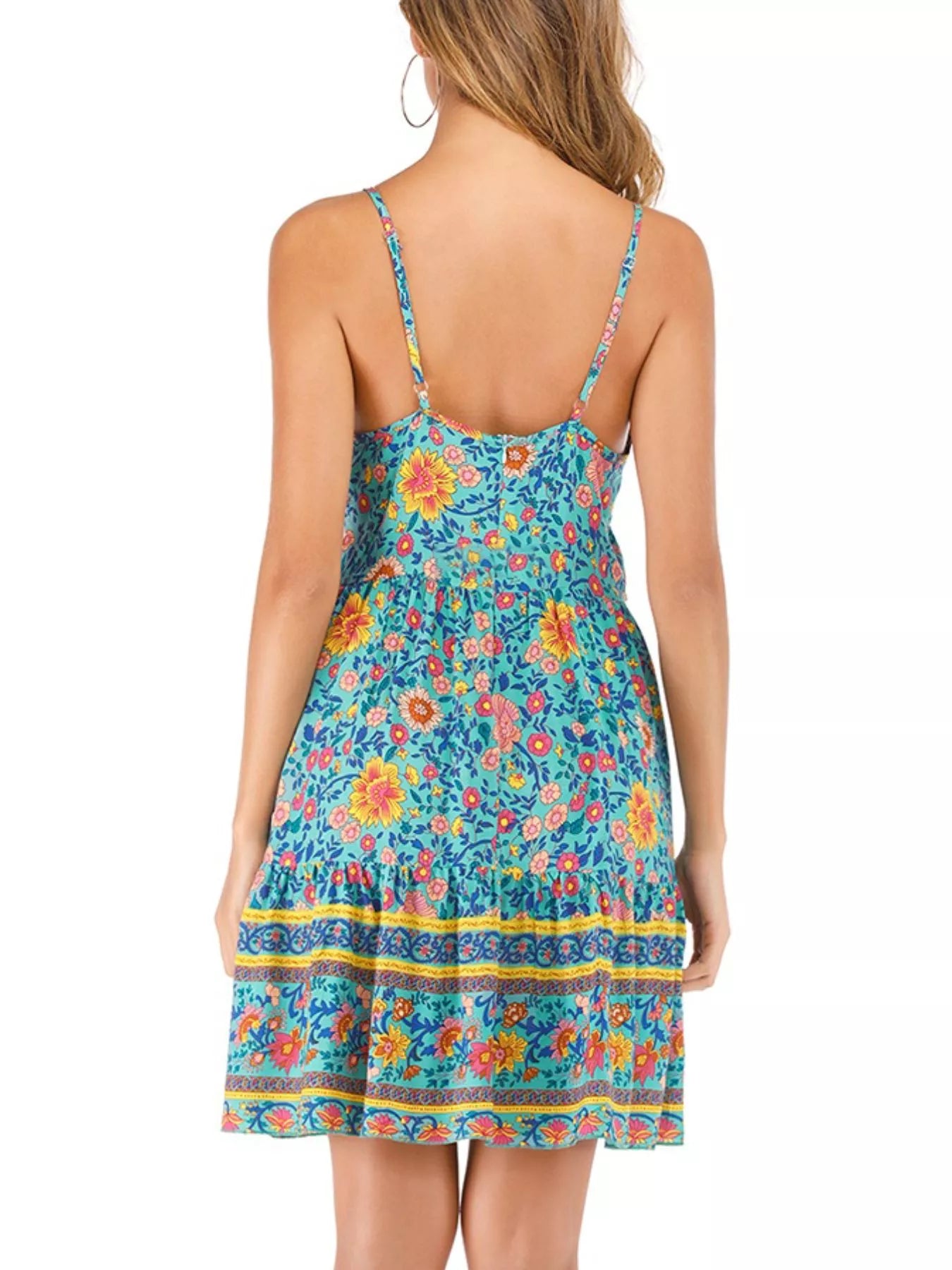 colorful turquoise floral boho sundress with lace-up neckline and flowy summer silhouette
