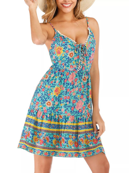 colorful turquoise floral boho sundress with lace-up neckline and flowy summer silhouette