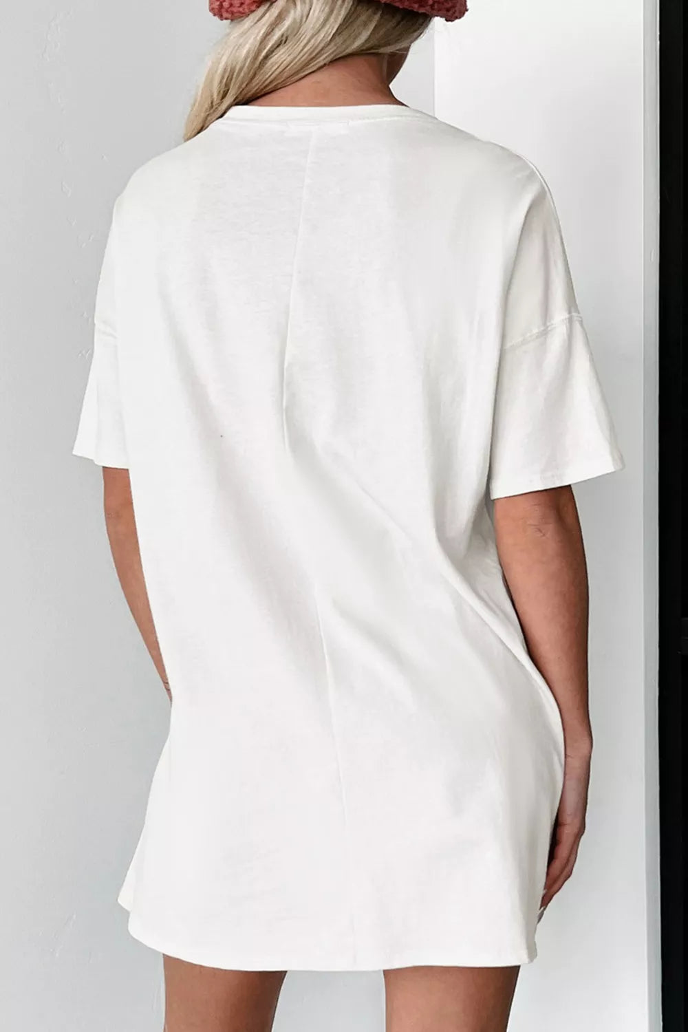 White oversized graphic tee with cowboy lobster and Yee Claw print