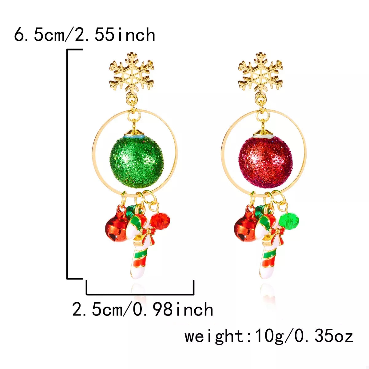 Gold snowflake holiday earrings with green and red glitter baubles, tiny bells, and candy-cane charms displayed on a red festive card.