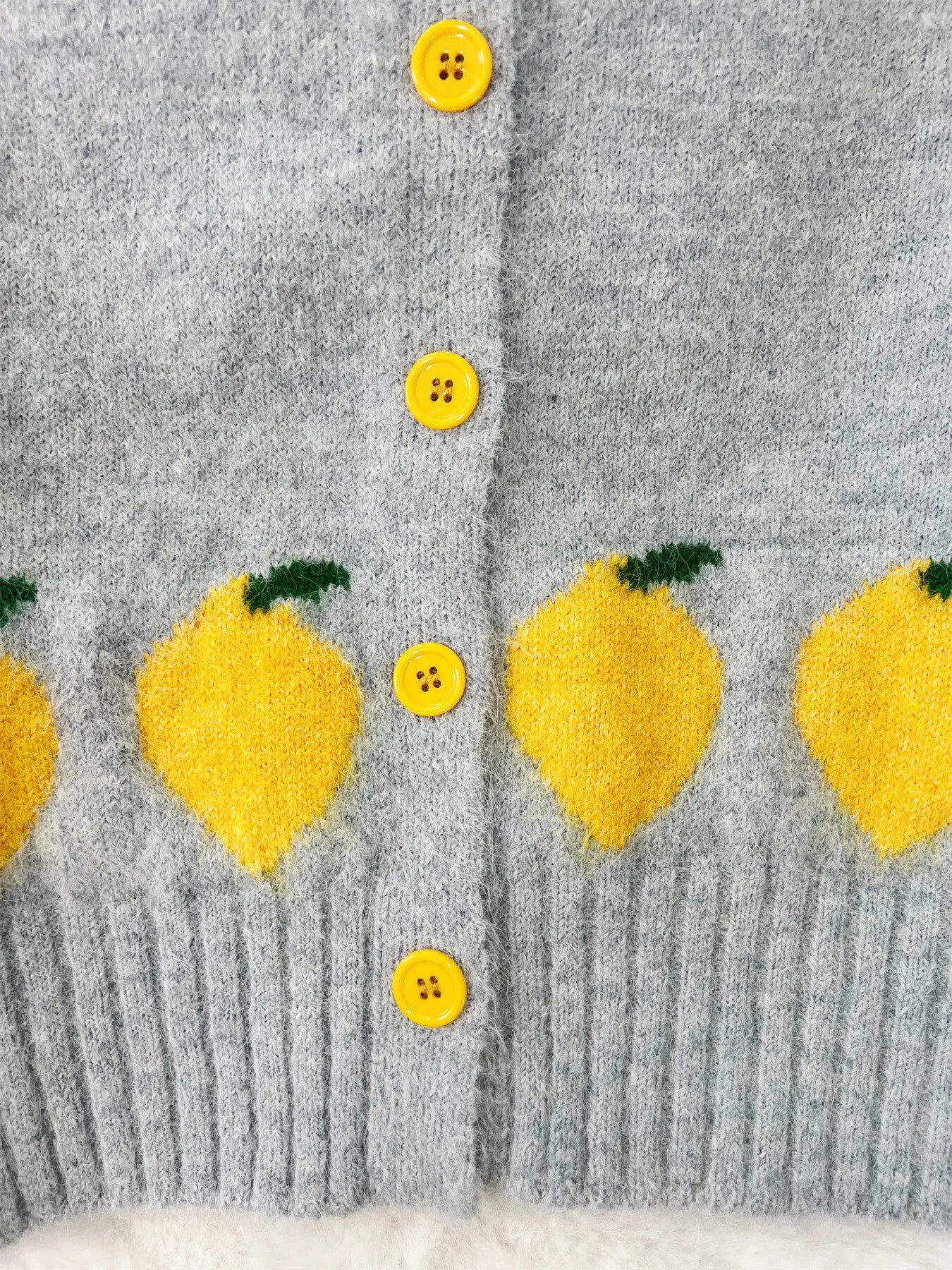Grey button-up cardigan with playful lemon pattern – Zest & Bloom style from A Whimsical Affair.
