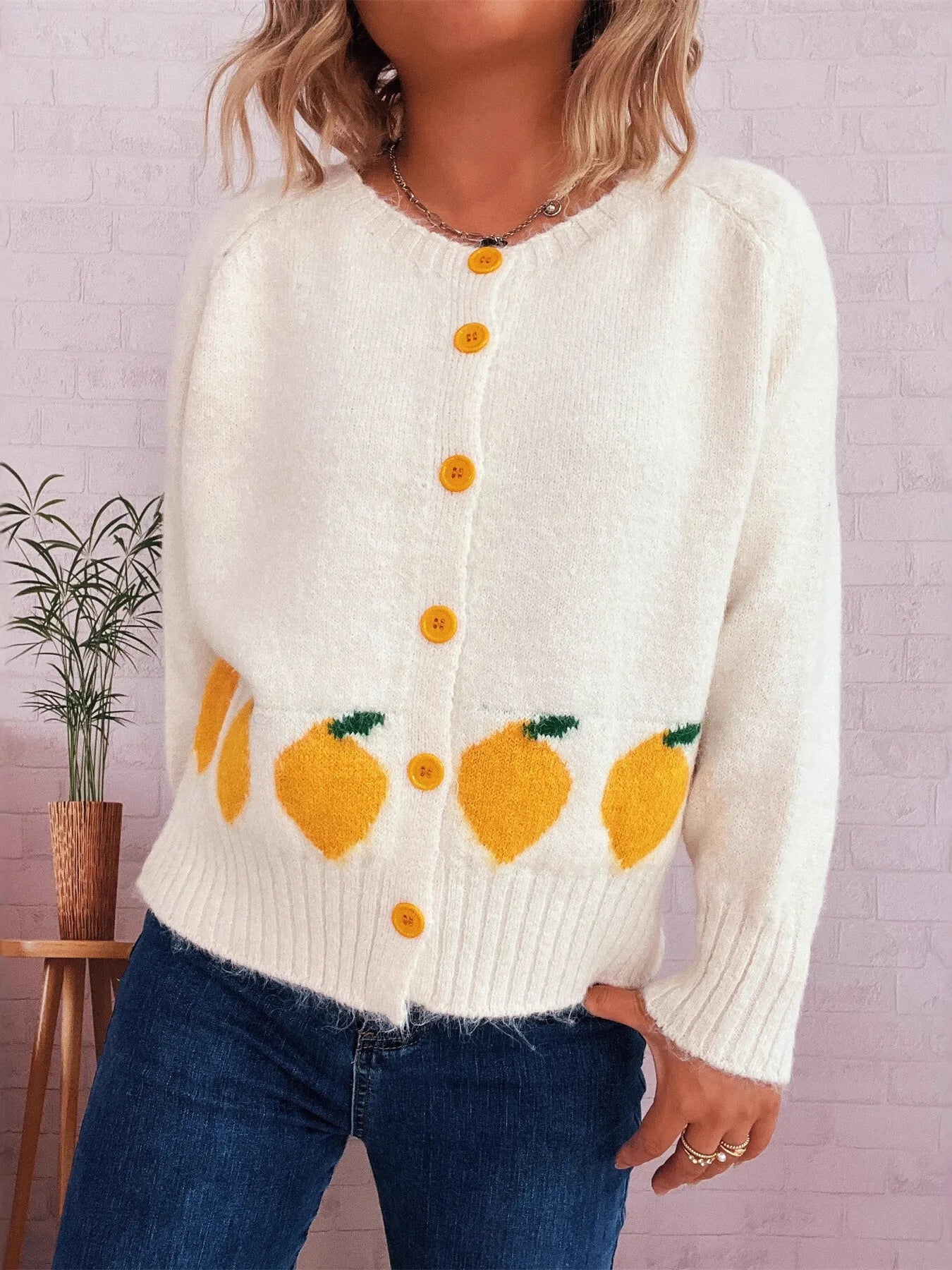White button-up cardigan with playful lemon pattern – Zest & Bloom style from A Whimsical Affair.