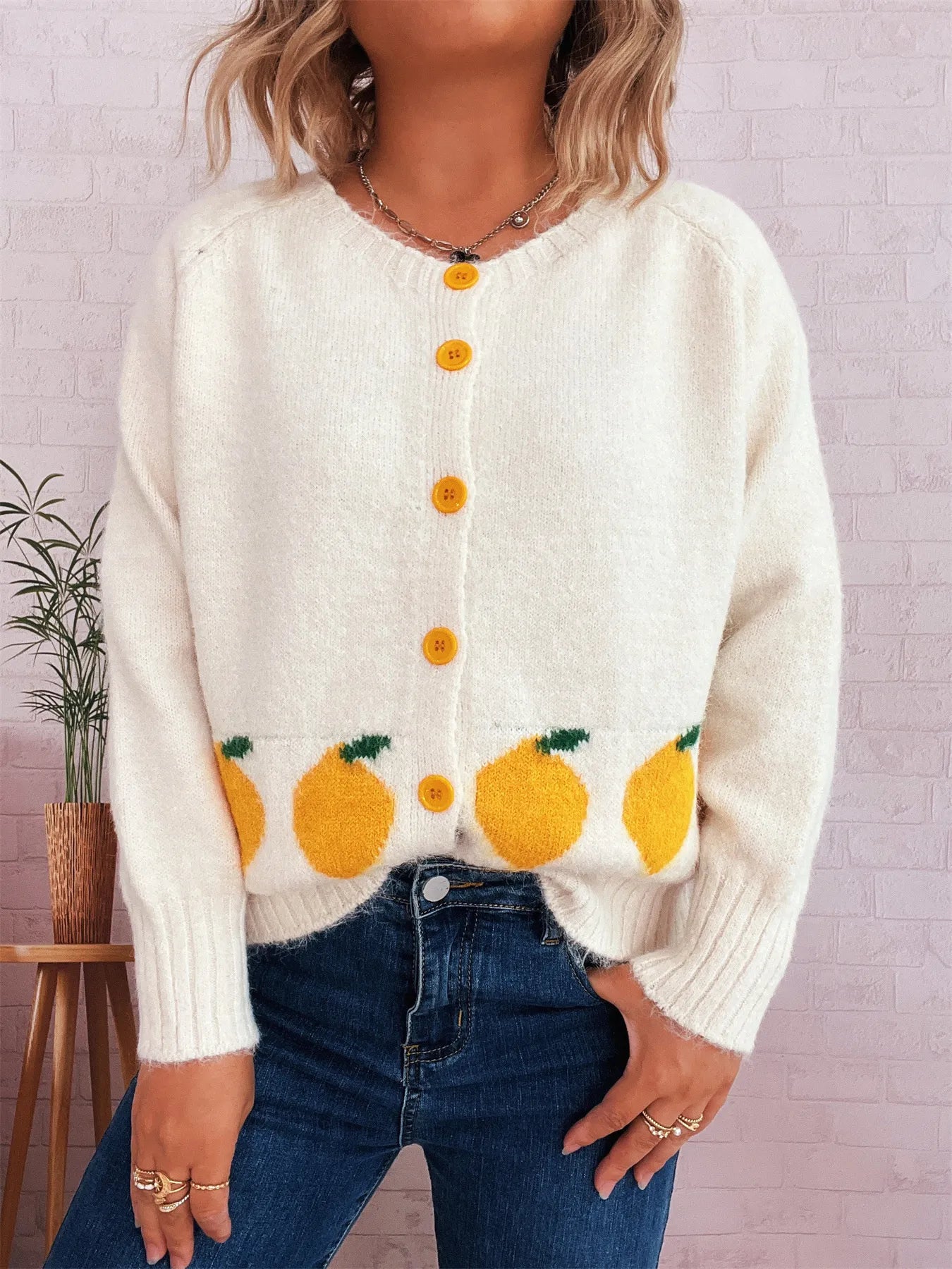 White button-up cardigan with playful lemon pattern – Zest & Bloom style from A Whimsical Affair.
